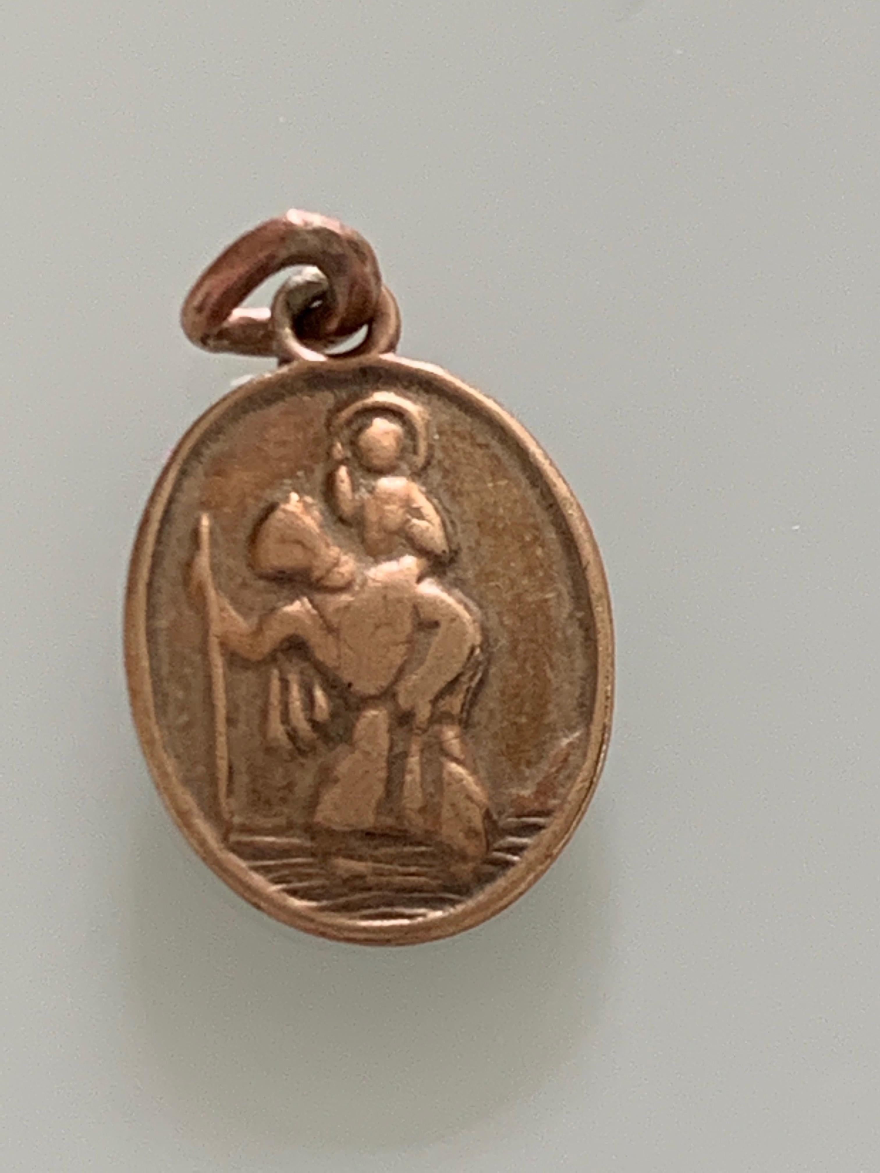 Rare 9ct Gold Brutalist design St.Christopher
Miniature pendant / Charm
measures 13mm x 10mm
Weight 0.8 gram
Goldsmith Willian J Sutton Limited 
Date 1963
Fully Hallmarked
and stamped 