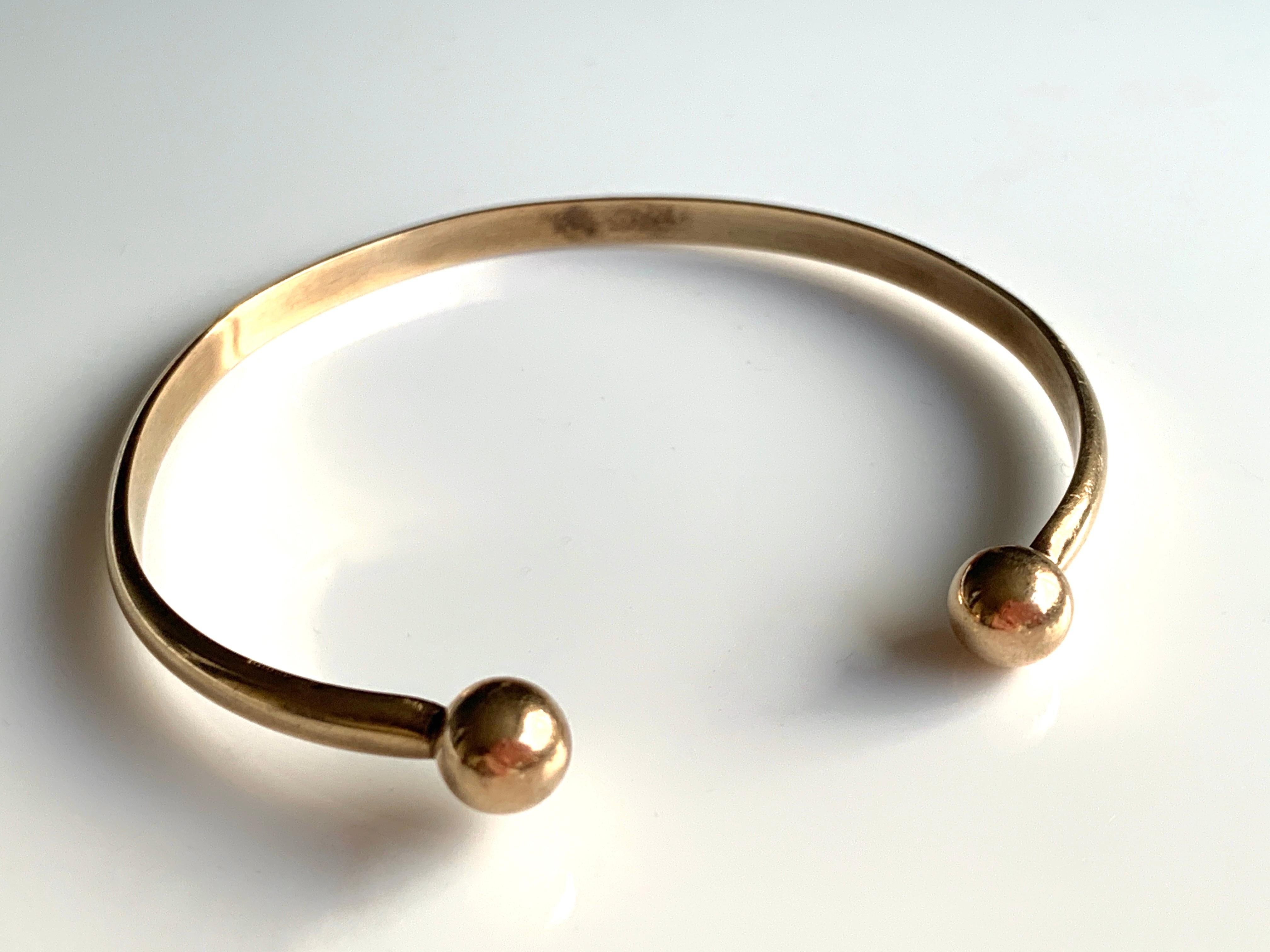 men's torque bangle gold