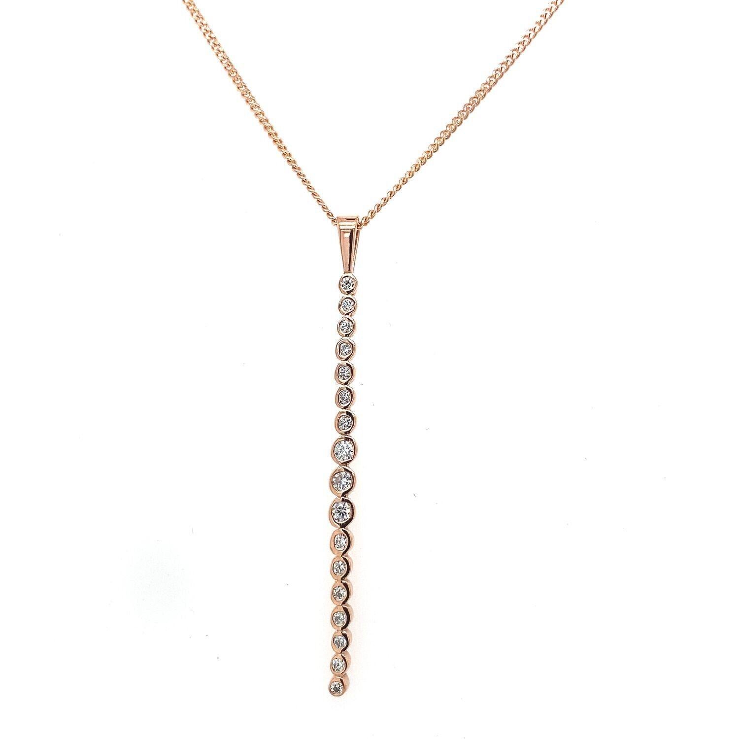 This beautiful Diamond drop pendant is set in a 9ct Rose Gold setting with 17 Round Brilliant Cut Diamonds, 0.40ct total Diamond weight, suspended from 16