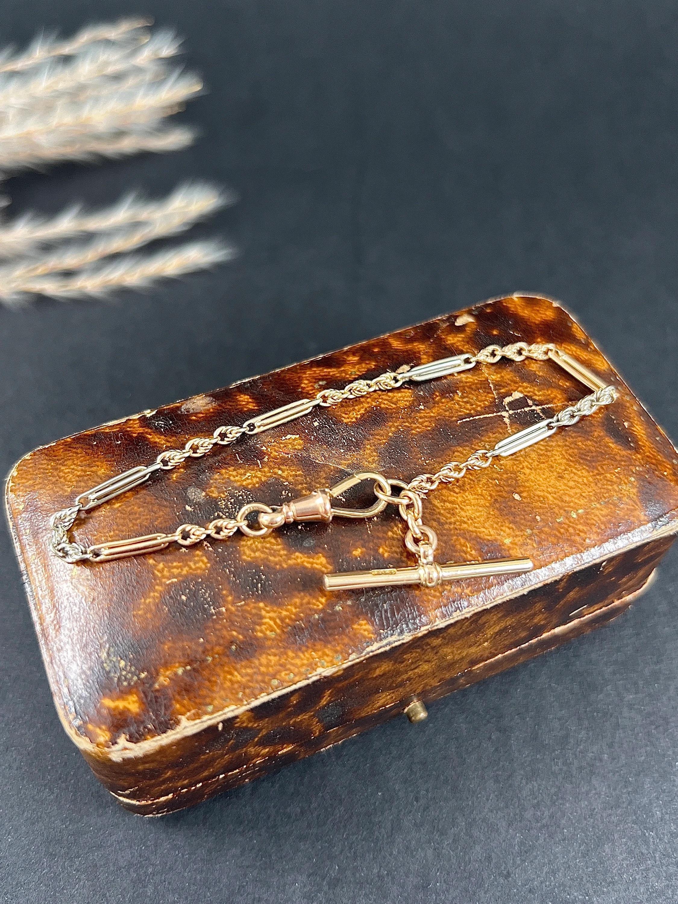 Antique Gold Bracelet 

9ct Gold Stamped

Circa 1900

Makers Mark J G & S

Introducing an exquisite 9ct two-color gold Edwardian bracelet that exudes timeless elegance. This stunning piece features alternating sections of rose gold and white gold