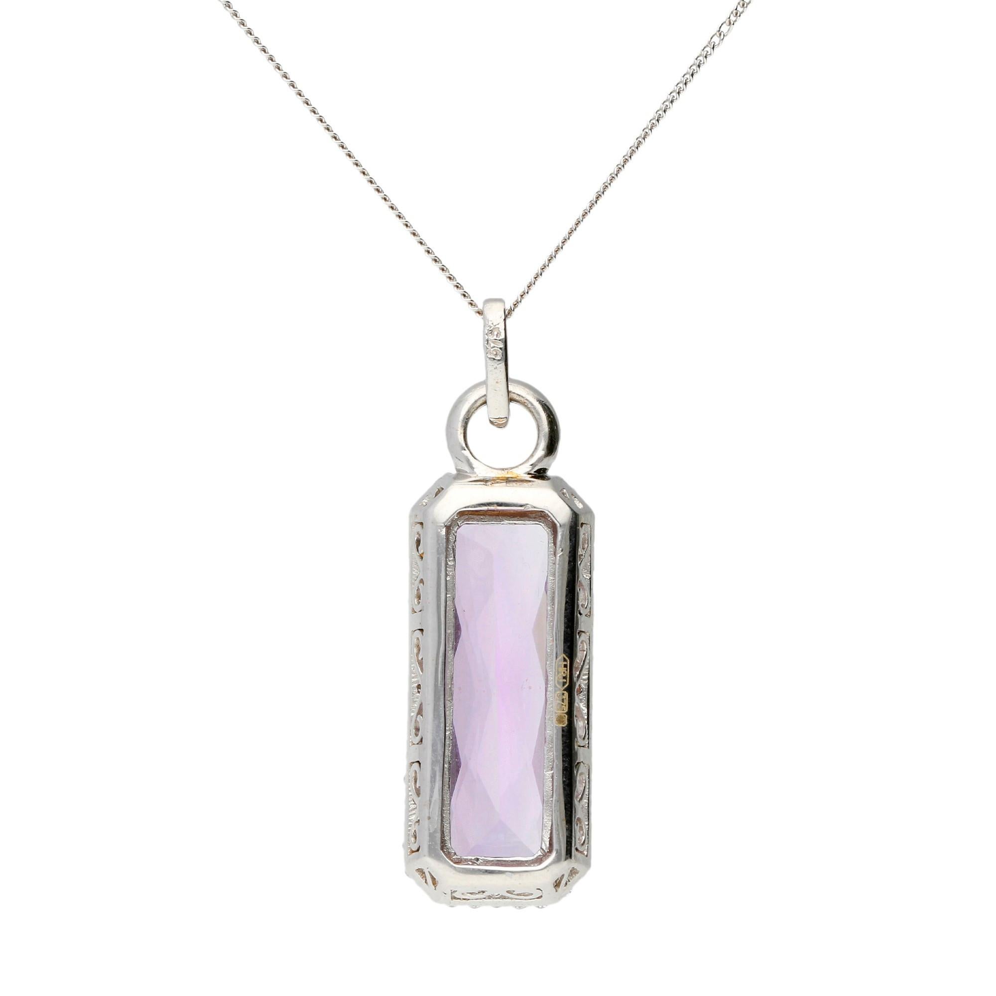 DESCRIPTION
A fabulous February treat! A real showstopping piece that will add a touch of Red Carpet glamour to your wardrobe.

Designed with an impressive amethyst that is framed by sparkling diamonds. An elegant accessory, that's perfect for an