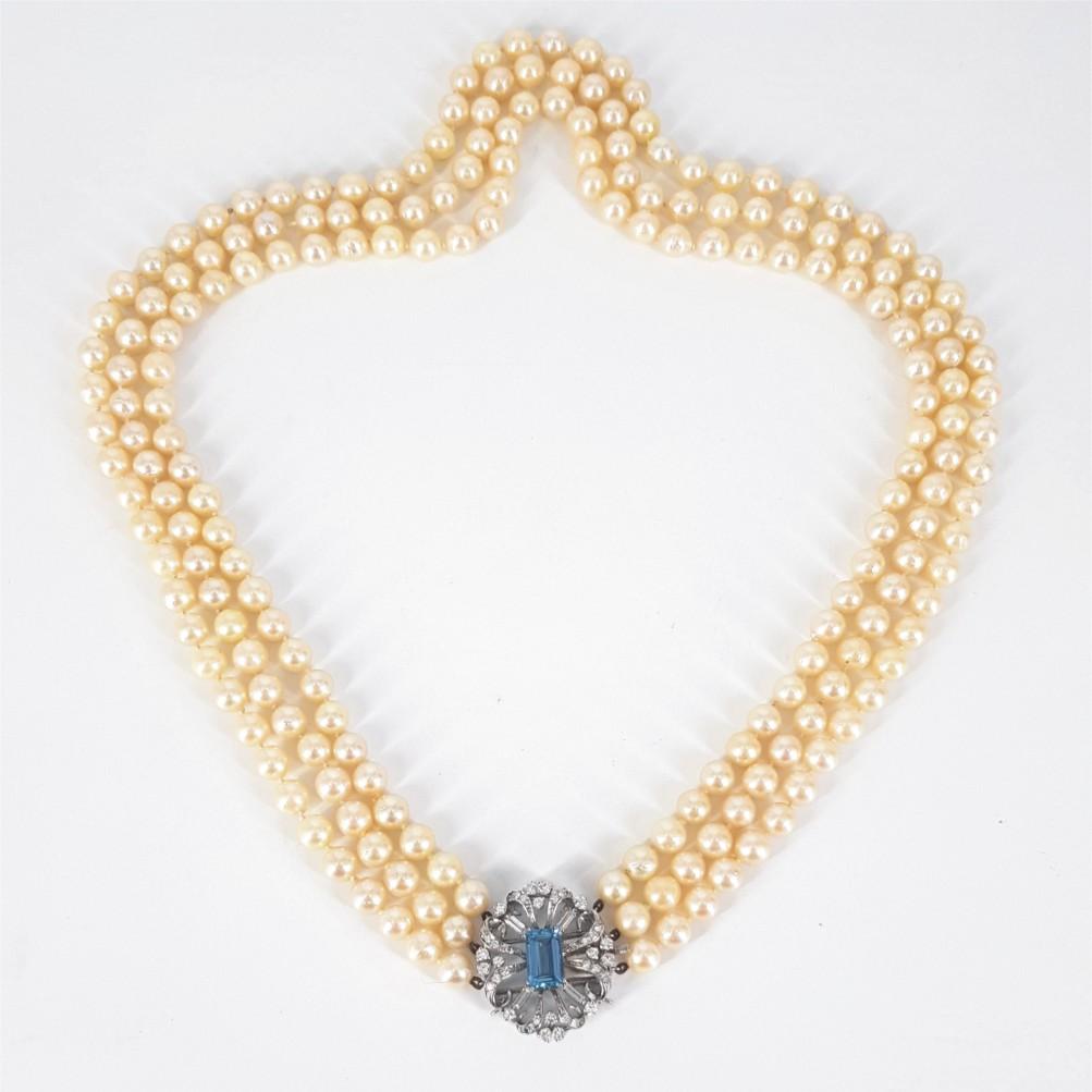 pearl necklace with side brooch