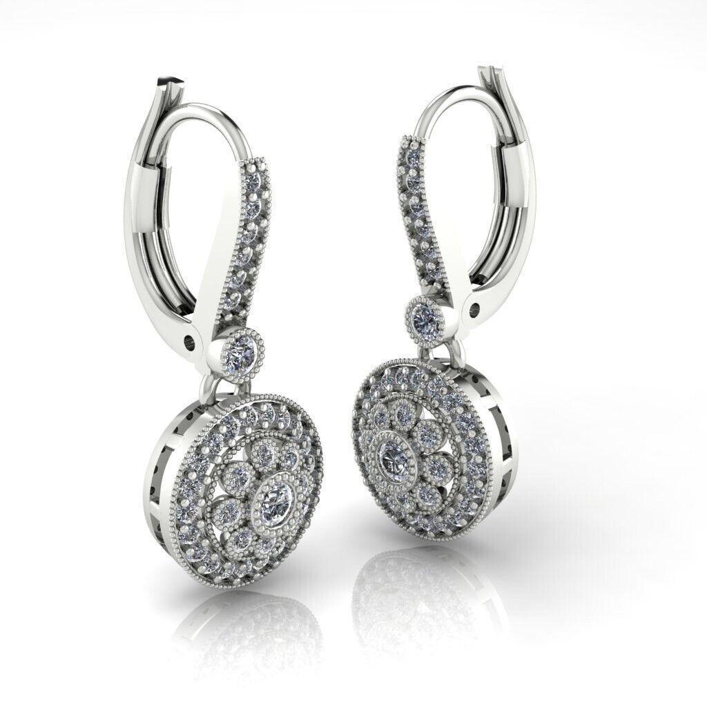 

A nudge to classic British heritage fine jewellery with Swiss craftsmanship

Sparkling 0.65ct Diamonds set in round halo drop earrings with secure leverback

 

Fully stamped 375 for gold & brand name

Pair is brand new, only used in one photo
