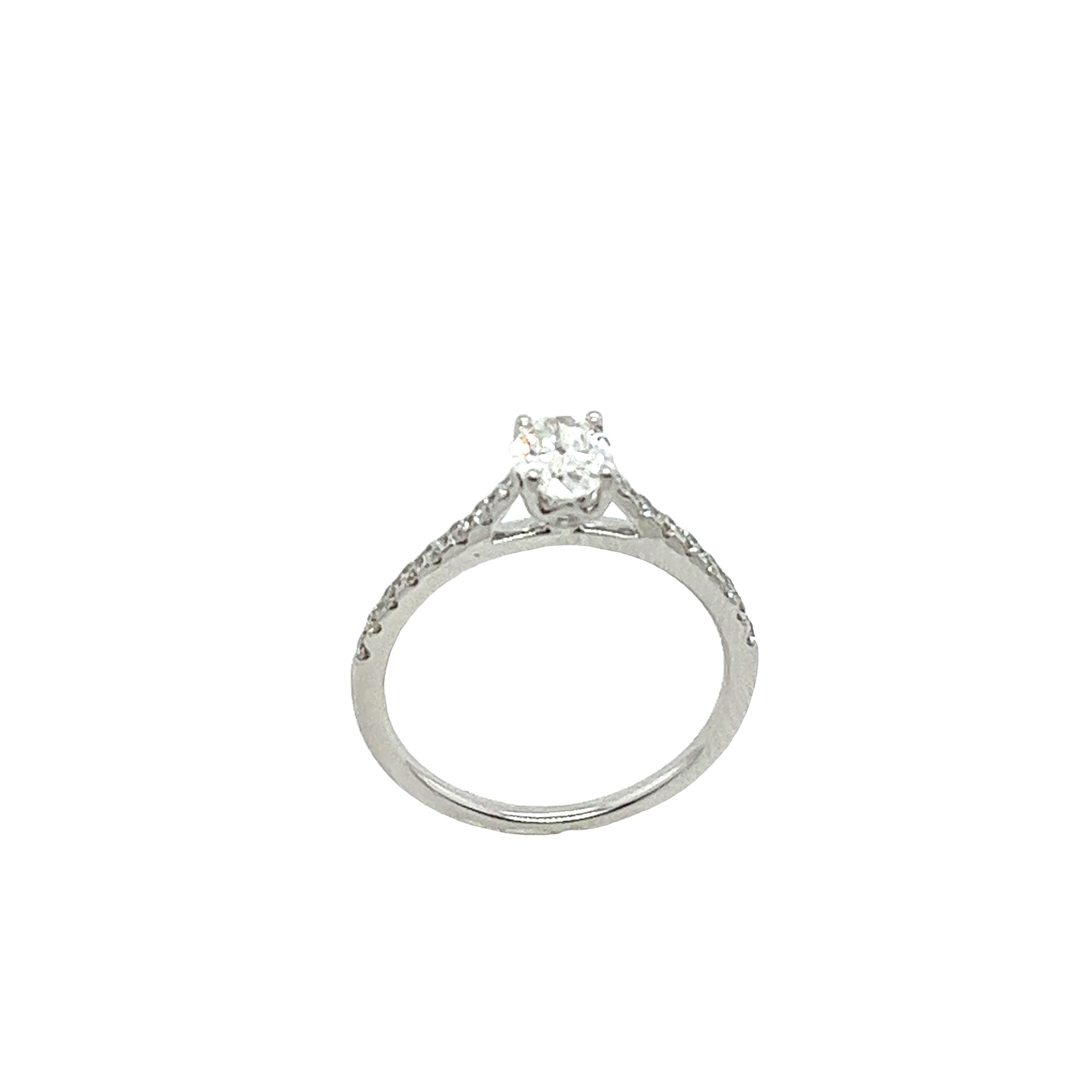 An elegant diamond ring for your engagement, set with 0.51ct oval cut natural diamond main stone
in 9ct white gold claw setting, and 16 diamonds on shoulders, 0.25ct .
Total Diamond Weight: 0.51ct & 0.25ct
Diamond Colour: G
Diamond Clarity:
