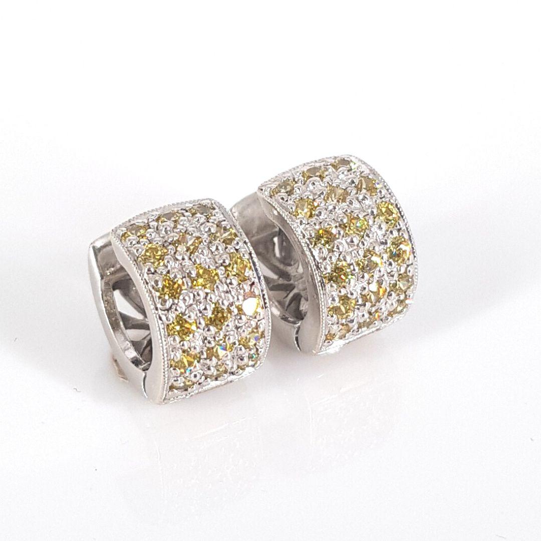 Unique
Item Attributes
Weight:			5.3 gram
Metal Colour: 		White Gold
Metal:			9ct
Stone Attributes
Number of Stones:	36 X Diamond 
Total weight:                    0.36ct
Cut:                                    Round brilliant Cut
Colour:           