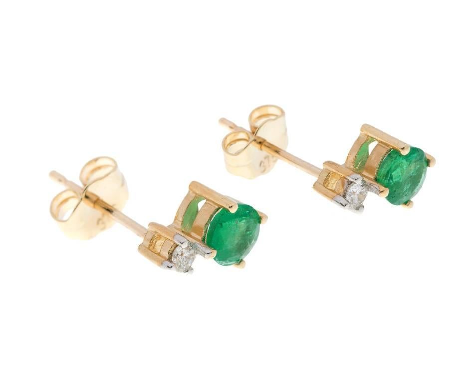 GEMMOLOGIST'S NOTES
This gorgeous pair of ladies emerald diamond earrings.. a thoughtful jewellery gift for a May birthday or simply a special occasion.

Each featuring a vivid emerald, suspended from a twinkling diamond surmount. A simply lovely