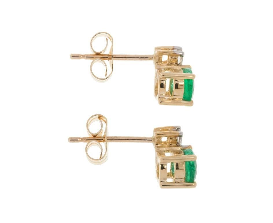 Modern 9 Carat Yellow Gold 0.30 Carat Emerald and 0.15 Carat Diamond Stud Earrings For Sale