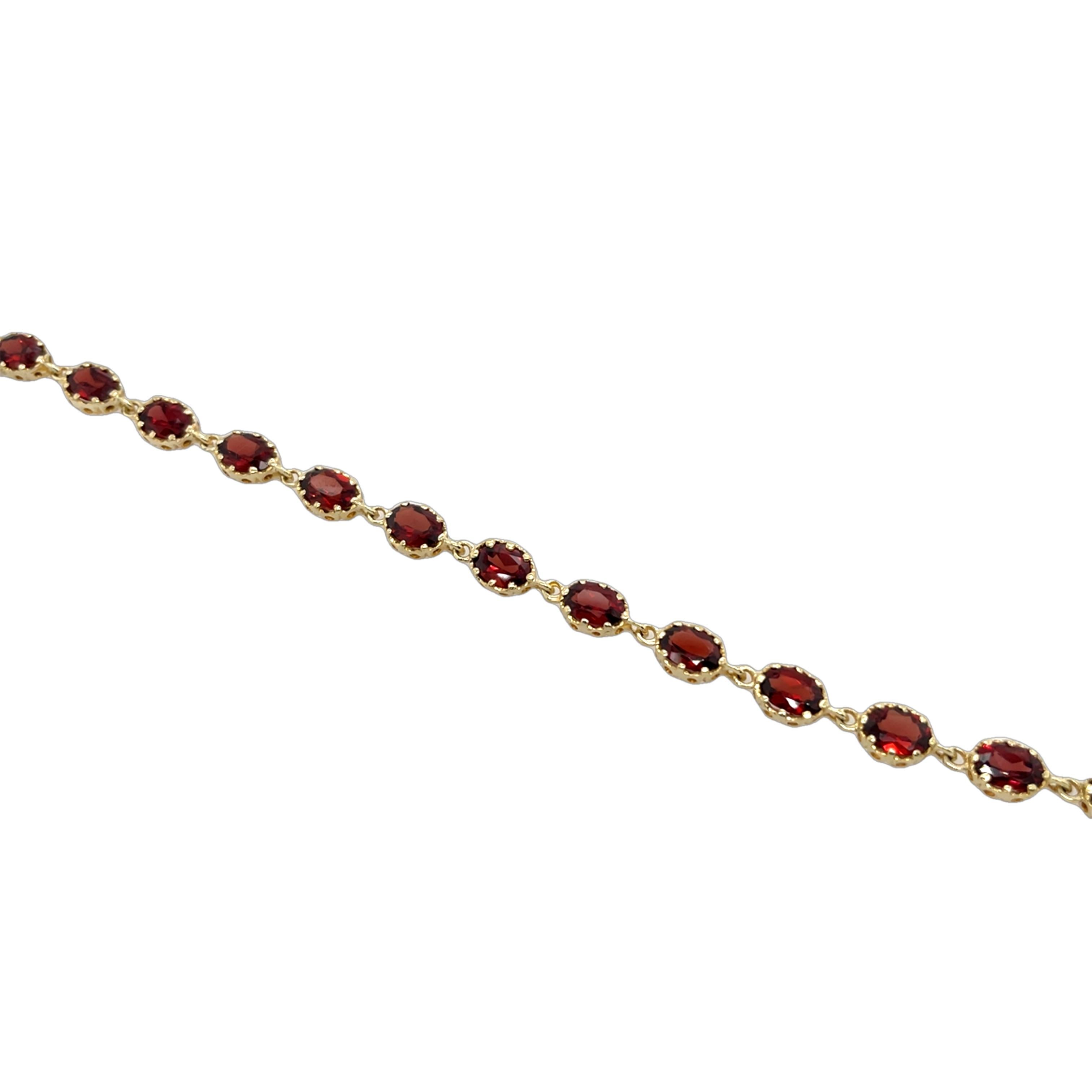 9ct Yellow Gold Bracelet Set With 16 oval Natural Garnets 1