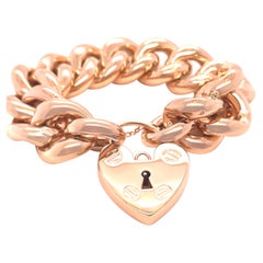 Bracciale in oro giallo 9ct con lucchetto a cuore 98,27g