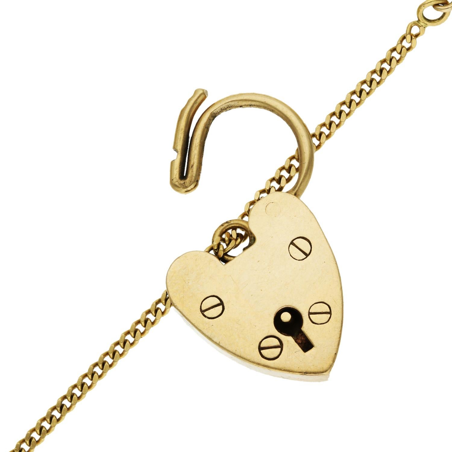 Introducing our classic 9ct Yellow Gold Curb Chain Bracelet, a timeless piece of jewellery with authentic Birmingham hallmarks from 1970. This exquisite bracelet features a durable and stylish curb chain design, making it the perfect foundation for