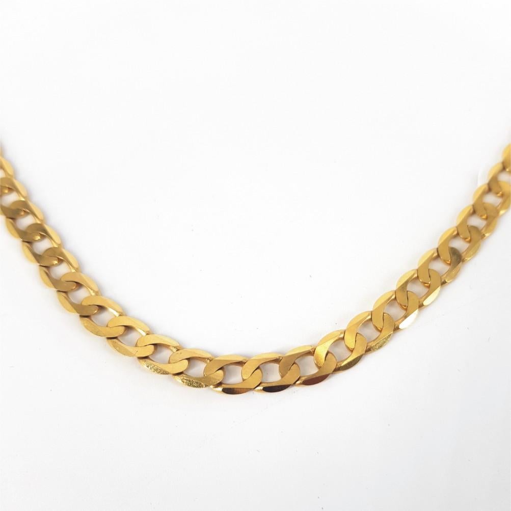 This stunning Curb Link Chain is set in 9carat yellow gold, weighs 31grams and is 62cm long and 6mm wide and 1mm thick.