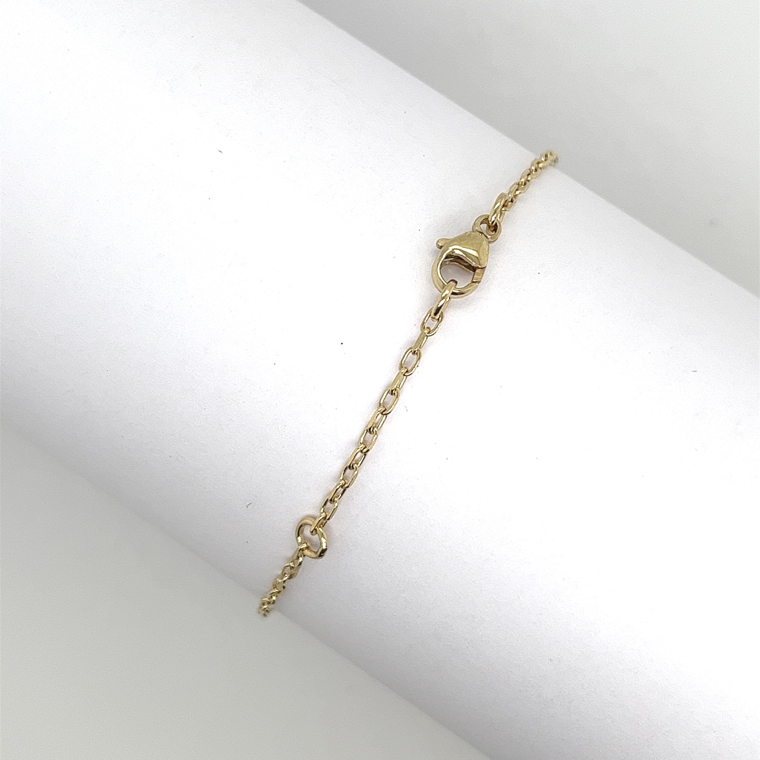 Made by Jewellery Cave- our exquisite 0.08ct diamond set and round citrine evil eye bracelet—
an enchanting fusion of style and symbolism. 
Crafted in 9ct yellow gold, the centrepiece of this mesmerizing bracelet is the striking Evil Eye charm,