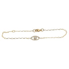 Bracciale Evil Eye con diamanti incastonati in oro giallo 9ct, pietra di nascita di aprile
