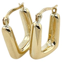 Orecchini a cerchio in oro giallo 9ct