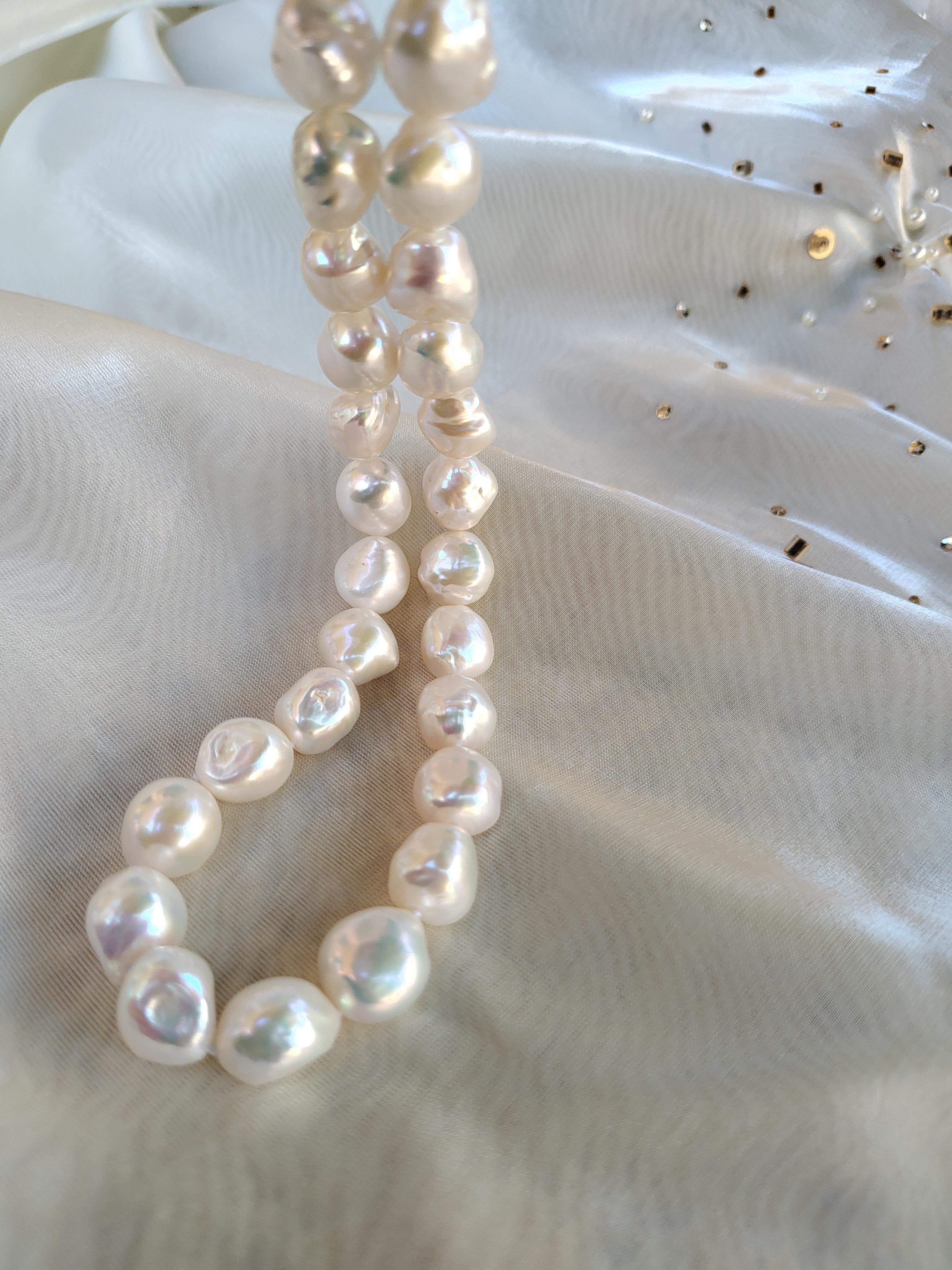Make a statement with this exquisite Keshi pearl necklace.
Given their unique organic shapes and amazing luster, Keshi Pearls are the most unique type of pearl, making them perfect for expressing individuality. 
This piece features 30 natural fresh