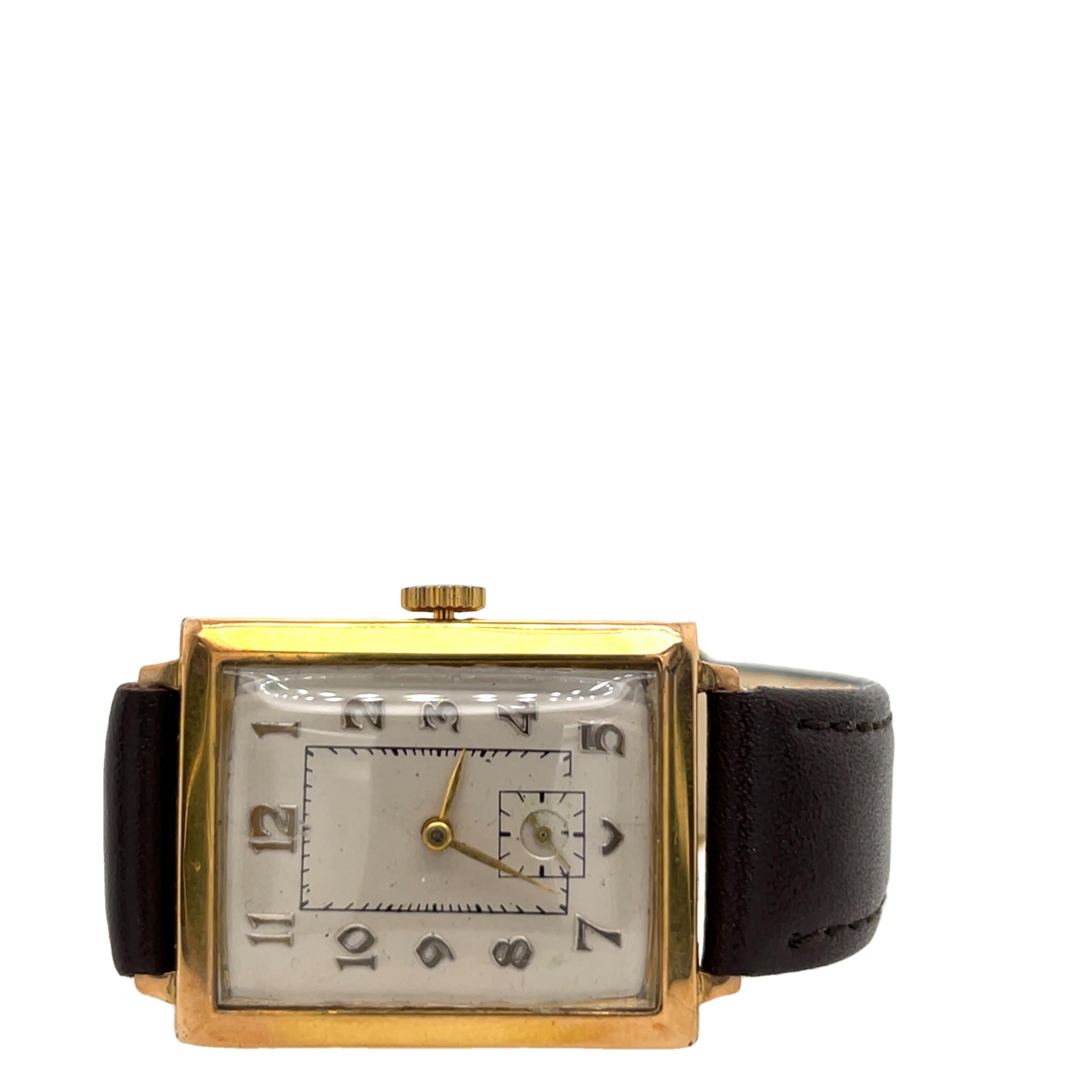 A classic 9ct yellow gold men's watch, paired with a sleek leather strap. 
The warm gold case complements the luxurious leather, creating a refined and timeless accessory. 
Perfect for adding elegance to everyday wear or special occasions.

Total