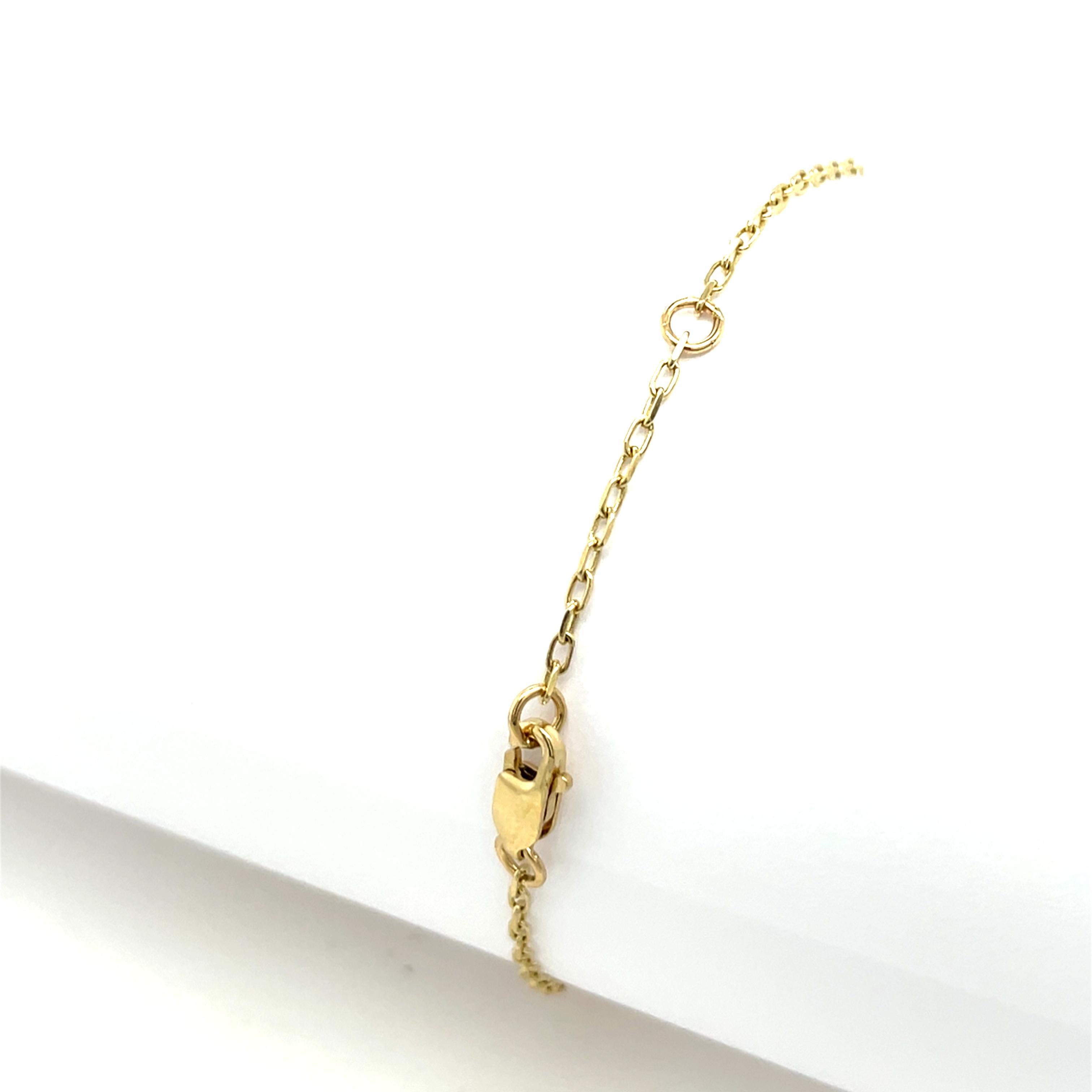 A striking evil eye bracelet crafted in 9ct yellow gold, 
featuring a deep green peridot, the August birthstone, as its centerpiece. The peridot is framed in a symbolic design for protection and good fortune.

Total Diamond Weight: 0.18ct 
Diamond