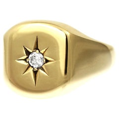 9ct yellow gold signet ring with star and diamond size V1/2