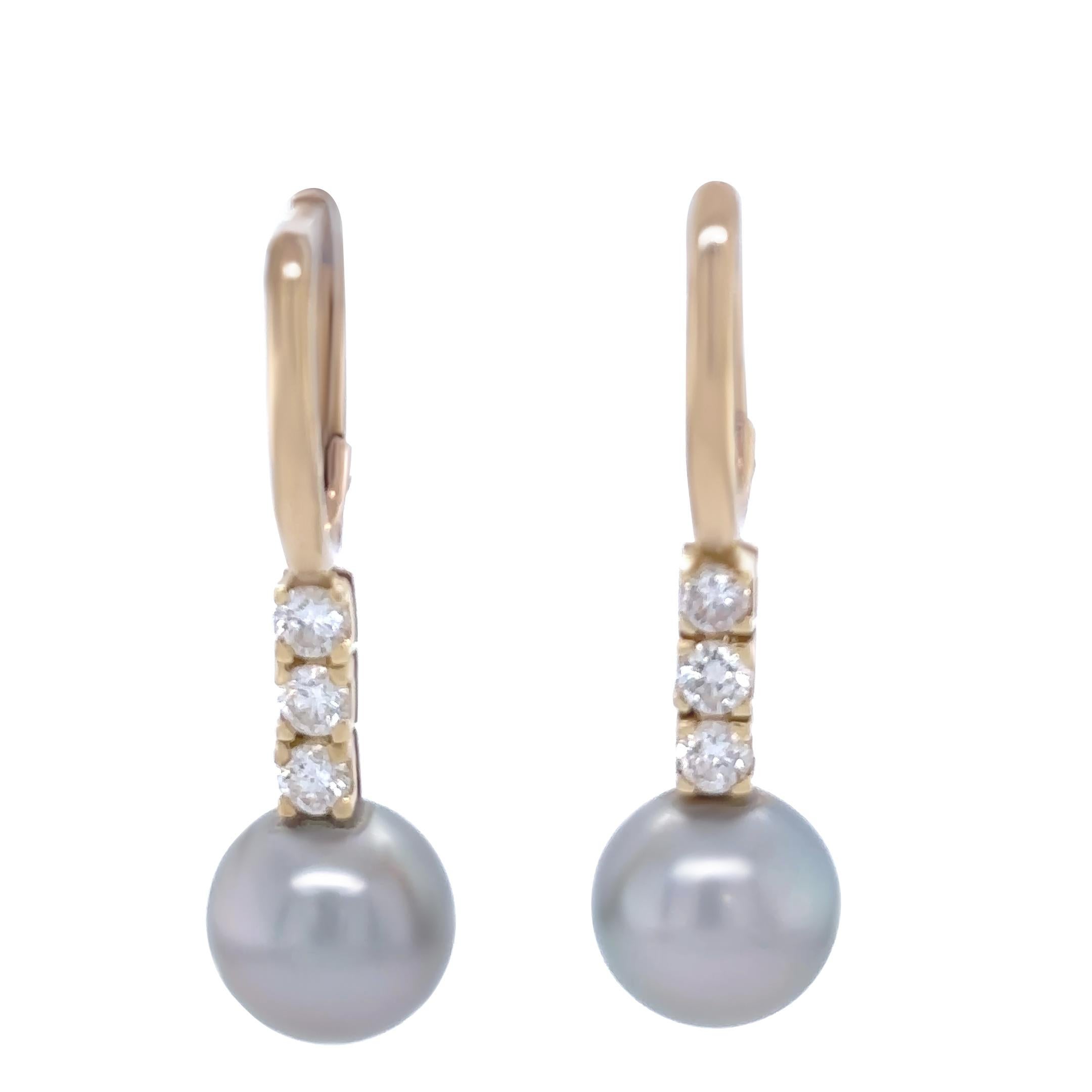 A pair of 9ct yellow gold drop earrings, each featuring a semi-round Tahitian type cultured pearl measuring 10.8mm. The pearls display a very good lustre with natural surface marks, showcasing a striking black tone with silver and aubergine