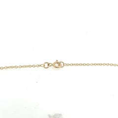 14ct Yellow Gold Tanzanite Pendant Suspended from 9ct Yellow Gold 16" Chain