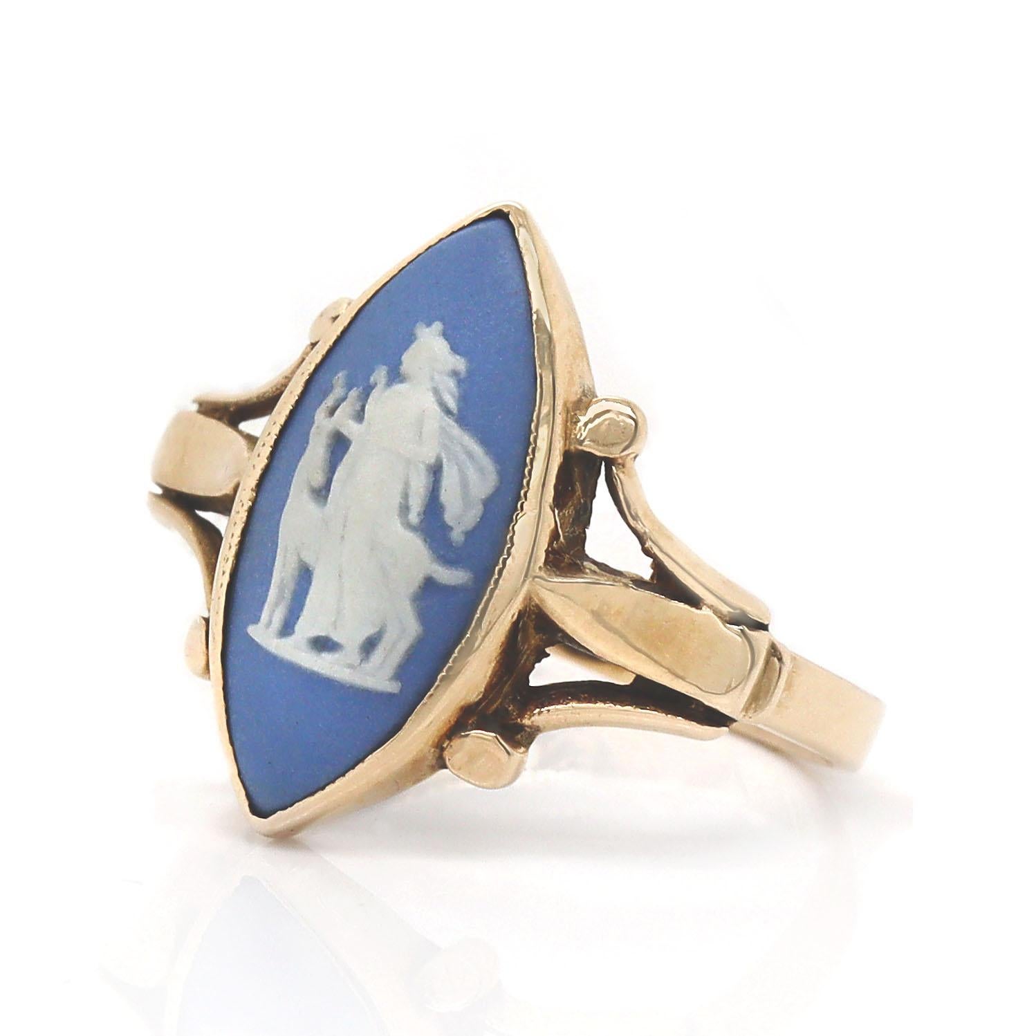 9CT Yellow Gold Wedgewood Dress Ring

This captivating piece features a beautifully carved marquise cut Wedgewood stone, showcasing a delicate light blue hue accented by soft white. The intricate carving evokes a mastery of detail, bringing the