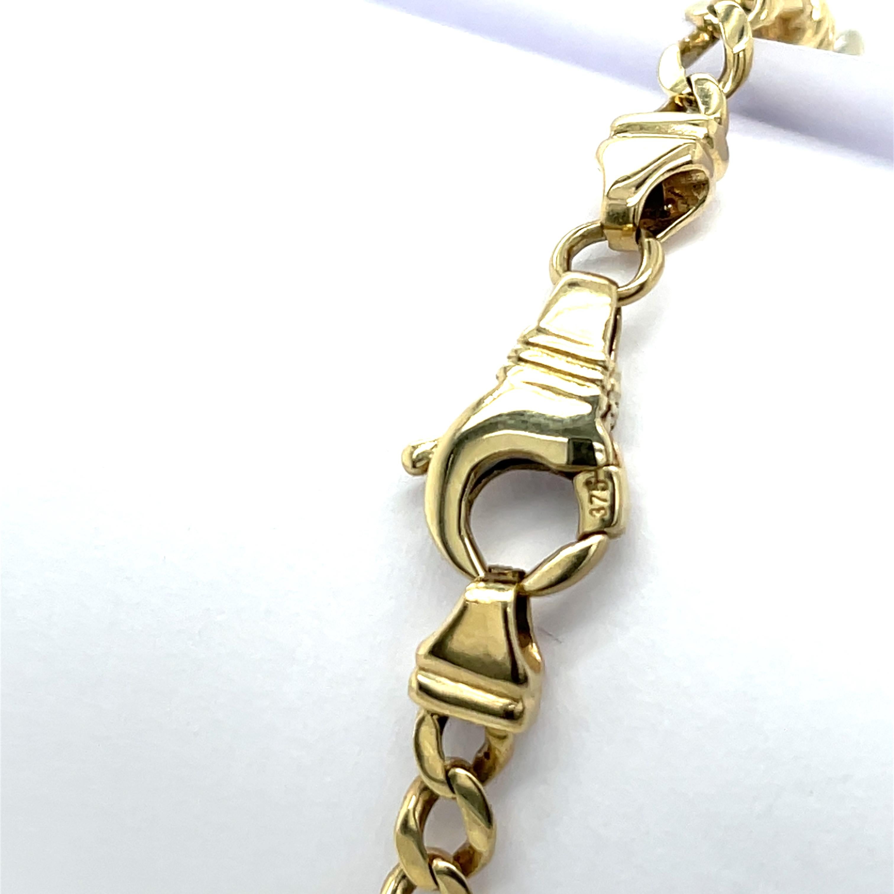 Pièce élégante et polyvalente, ce bracelet à chaîne en or 9ct associe l'or jaune et l'or blanc pour un look bicolore moderne. Avec un poids substantiel de 16,15 grammes, il offre à la fois durabilité et sensation de luxe, ce qui le rend parfait pour