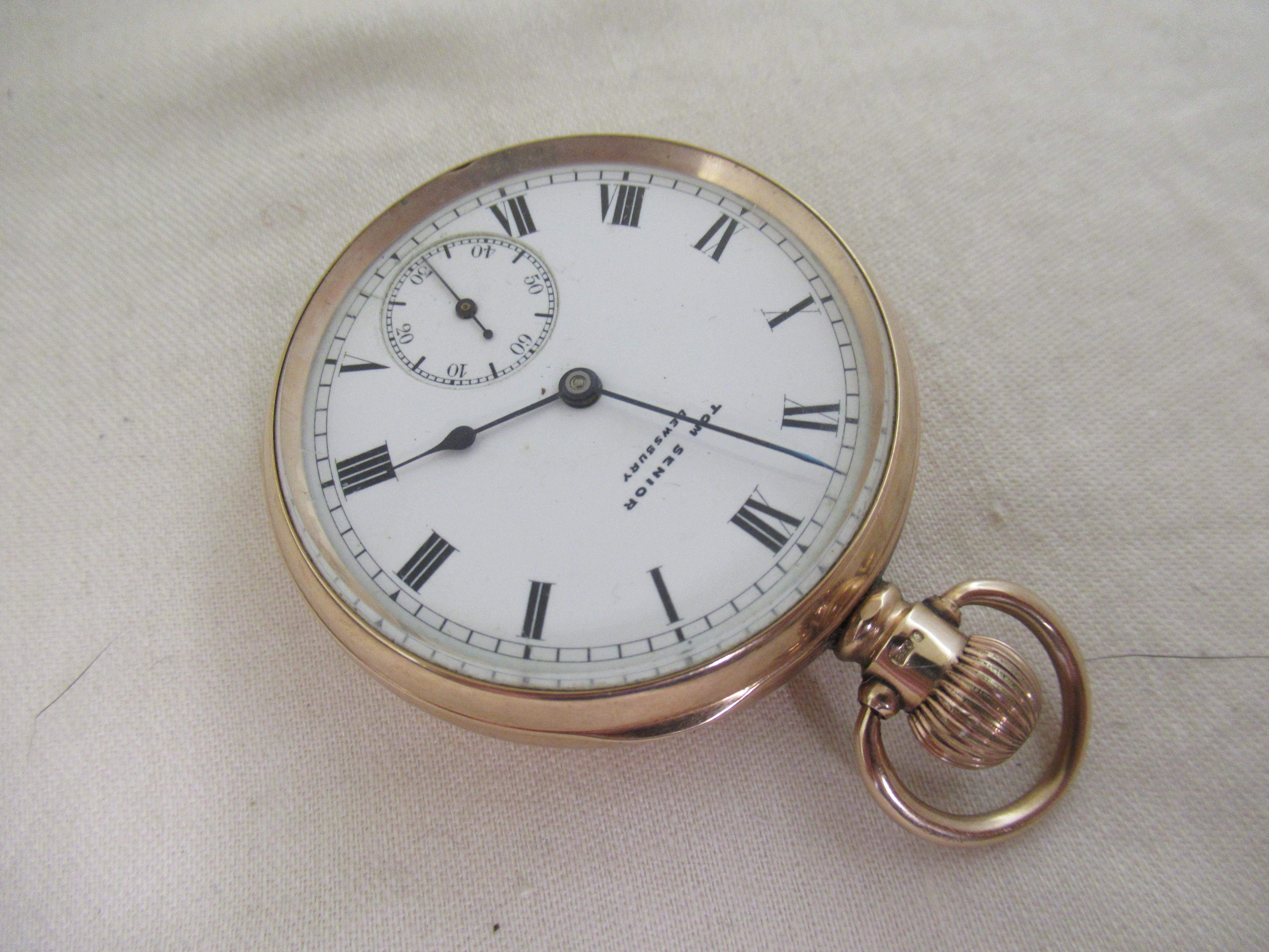 PRESENTATION WALTHAM TRAVELER OPEN FACED MAN`S POCKET WATCH
-----------
9ct. Gold Case stamped with the maker`s initials - ALD, for Aaron Lufkin Dennison of
                                                                                            