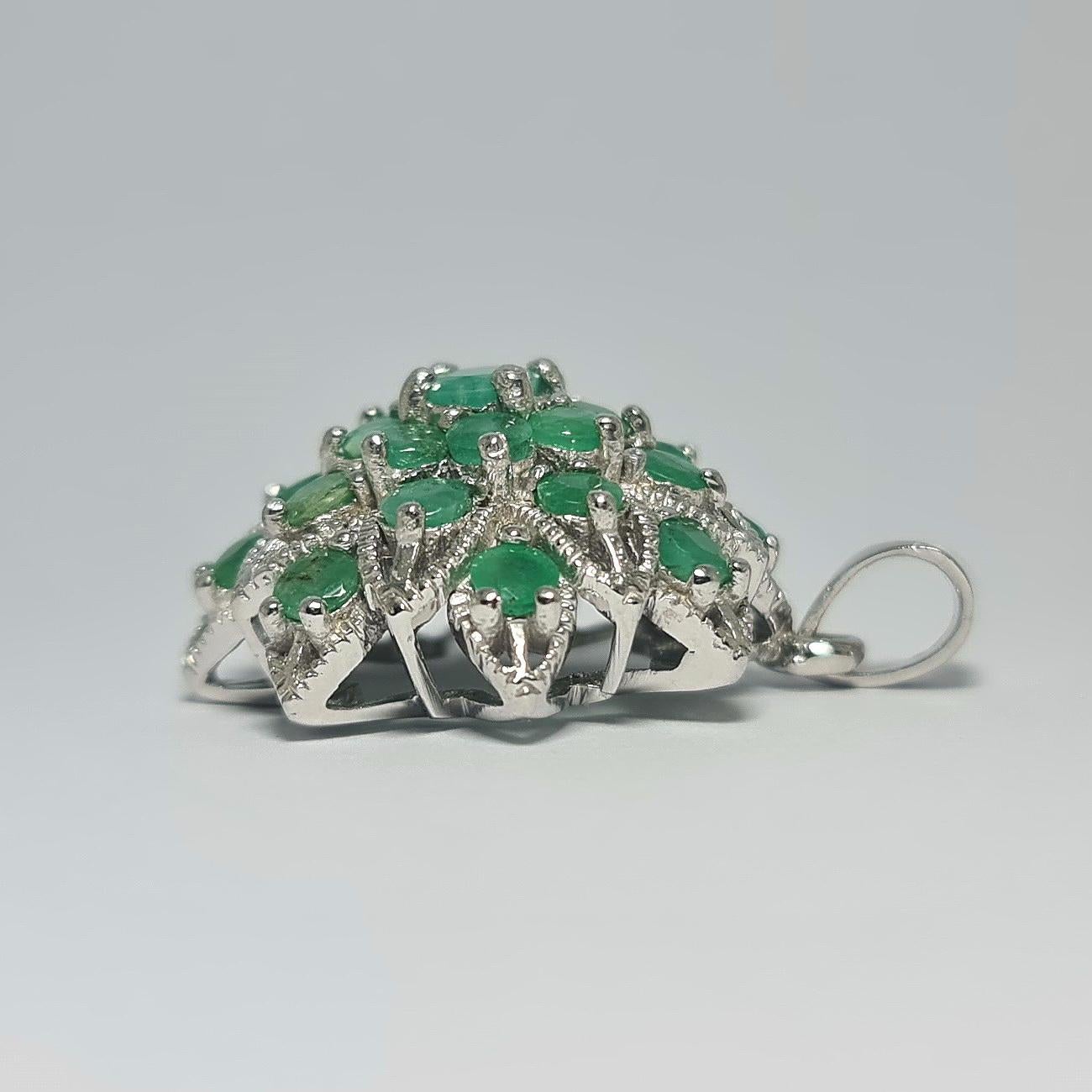Natural Emerald totalling over 9 Cts set in pure .925 Sterling Silver with Rhodium Plating