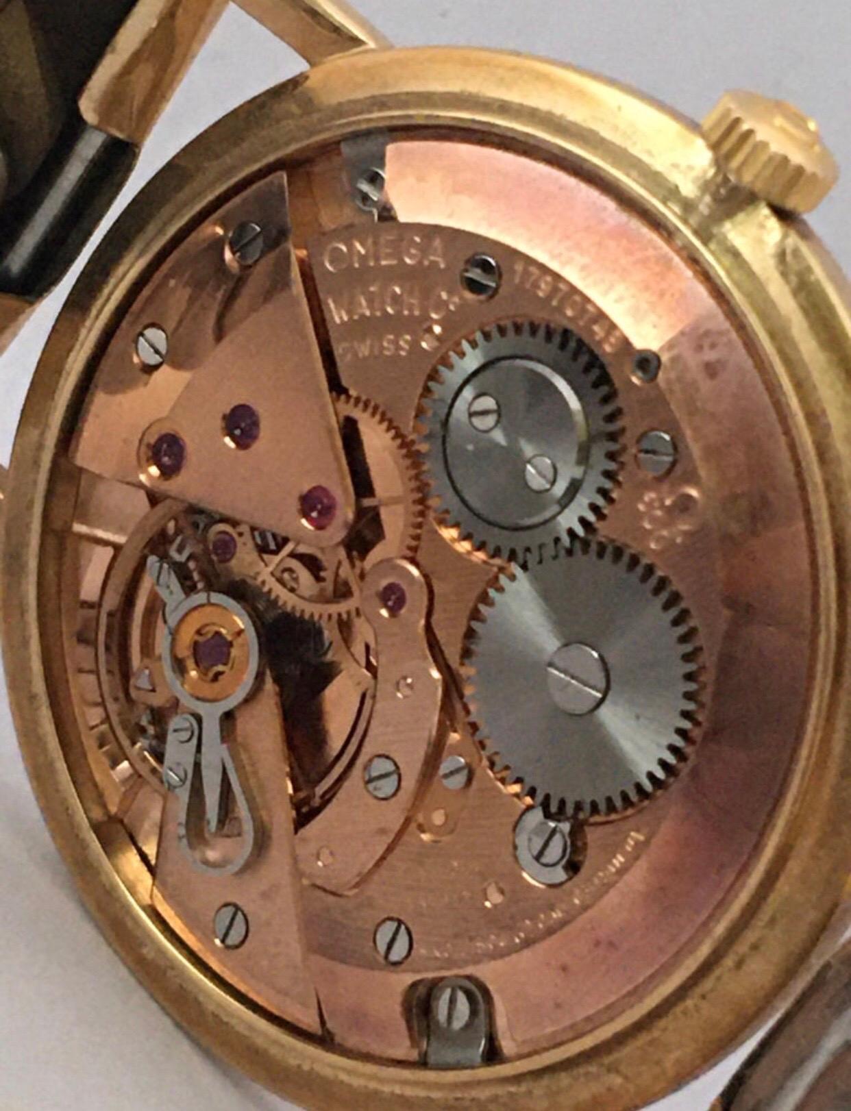 9 Karat Gold und gerolltes Goldarmband Omega Mechanische Uhr 1960er Jahre im Angebot 6