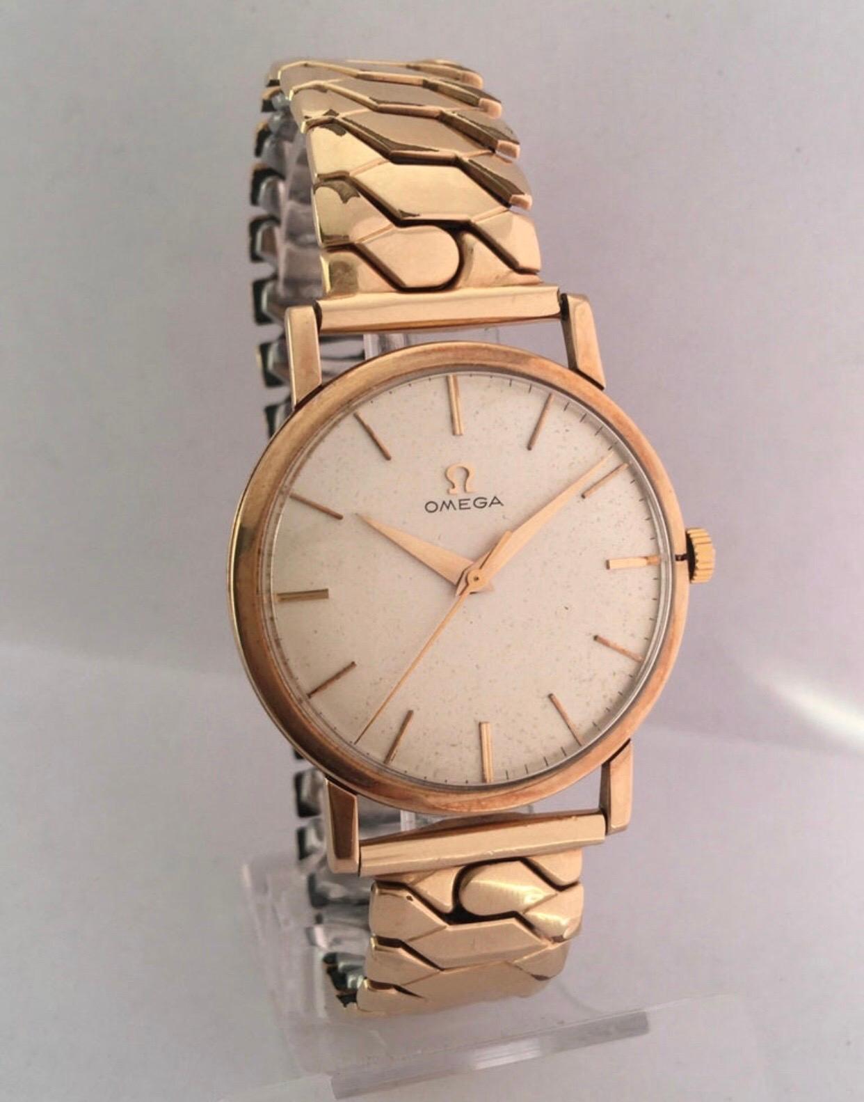 9 Karat Gold und gerolltes Goldarmband Omega Mechanische Uhr 1960er Jahre im Angebot 2