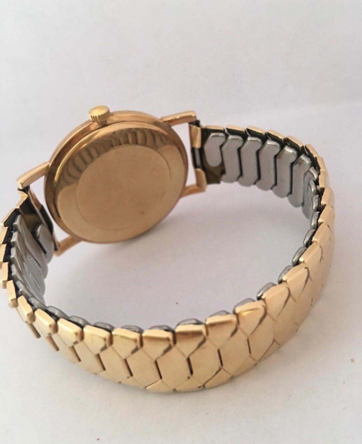 Women's or Men's 9 Karat Gold and Rolled Gold Bracelet 1960s Omega Mechanical Watch For Sale