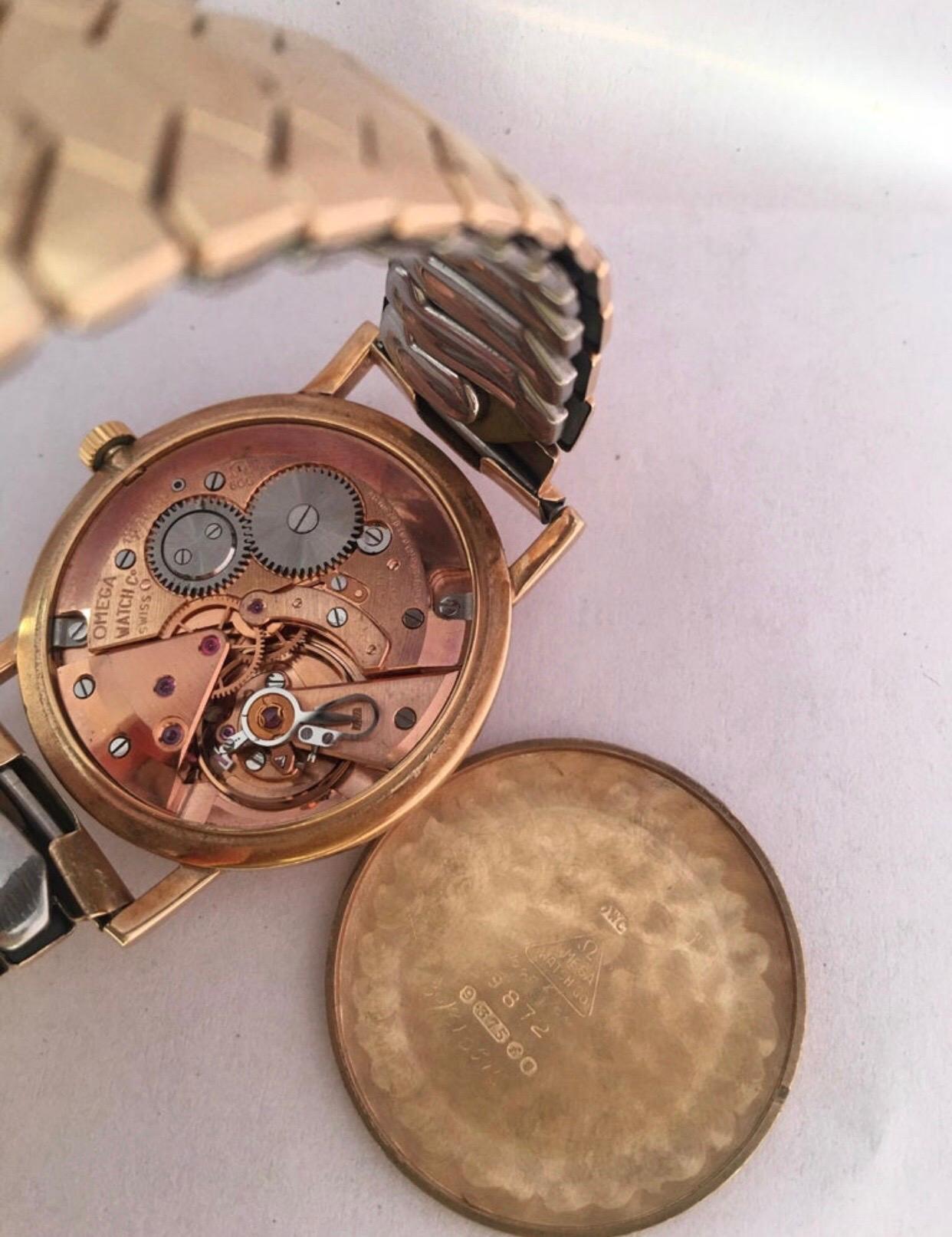 9 Karat Gold und gerolltes Goldarmband Omega Mechanische Uhr 1960er Jahre im Angebot 5