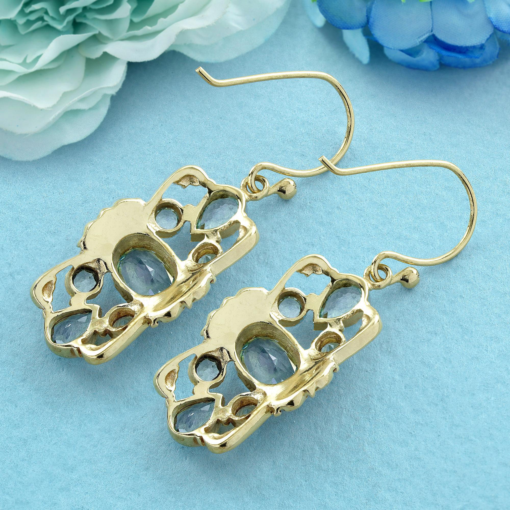 Vittoriano Set di gioielli con ciondolo e orecchini in stile vittoriano in oro blu Topazio 9K in vendita