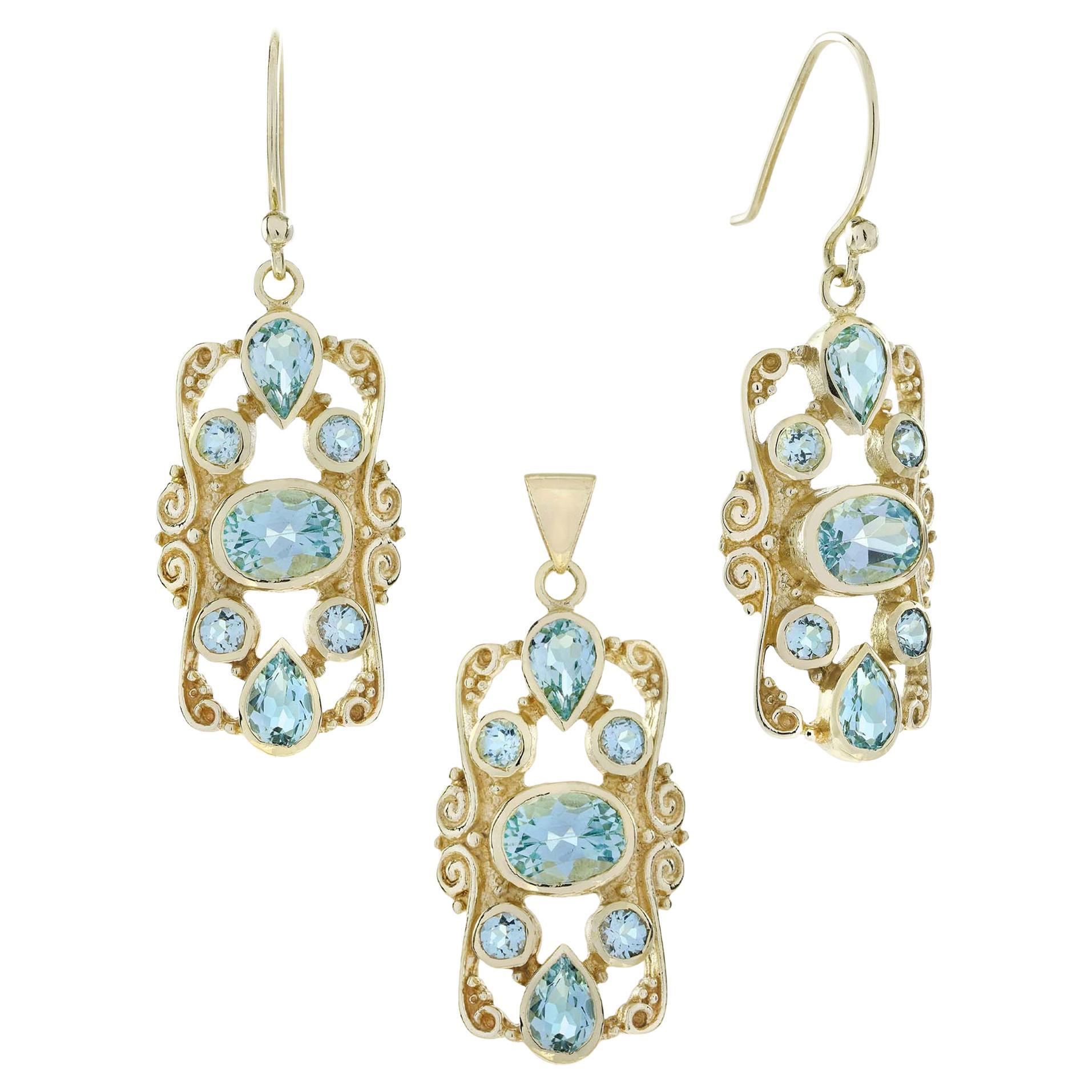 Set di gioielli con ciondolo e orecchini in stile vittoriano in oro blu Topazio 9K in vendita