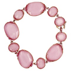 Armband aus 9 Karat Gold in Doppelt (Bergkristall und Fasern) mit rosa Saphiren und Diamanten