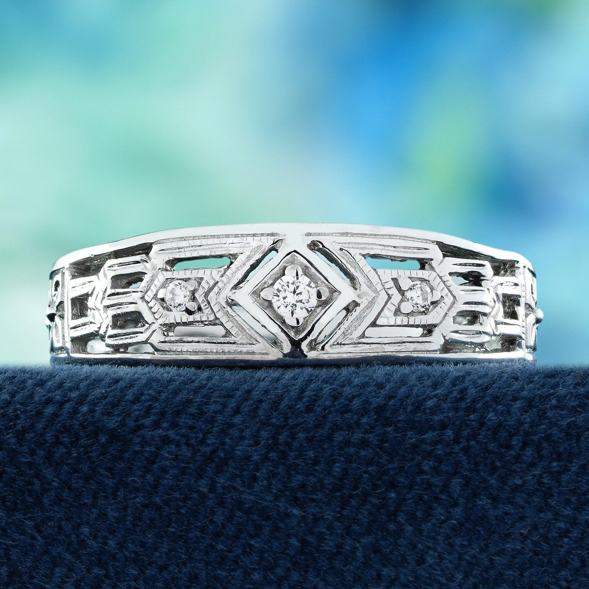 A true celebration of classic craftsmanship. At its heart, a brilliant diamond sparkles with unmatched clarity, symbolizing everlasting beauty. The intricate filigree setting wraps the stone in delicate, lace-like metalwork, inspired by antique