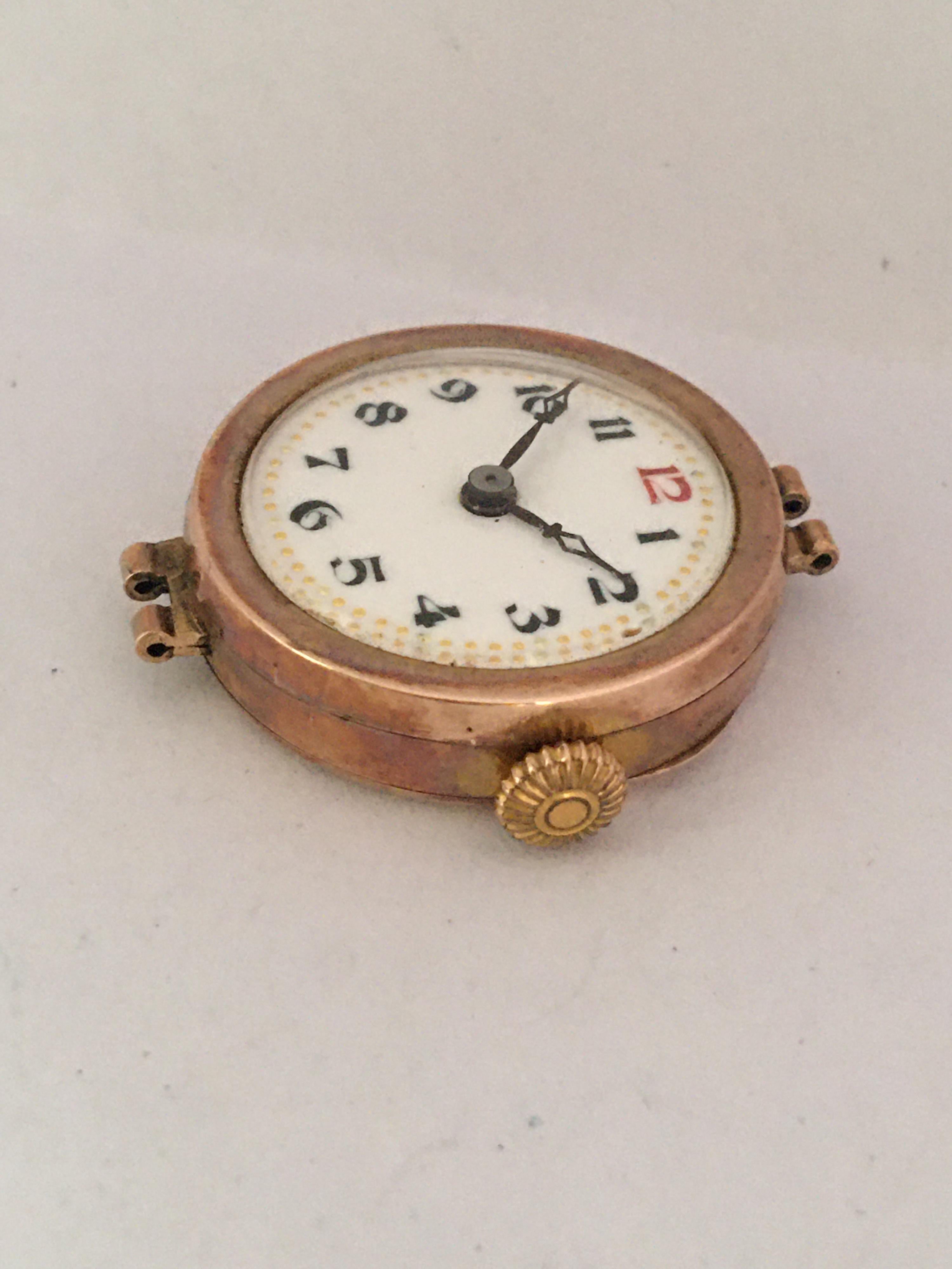 This beautiful pre-owned 26mm diameter antique hand-winding ladies gold watch is in good working condition and it is running well. Visible signs of ageing and wear with light marks on the glass and on the gold watch case as shown. So tiny dents on
