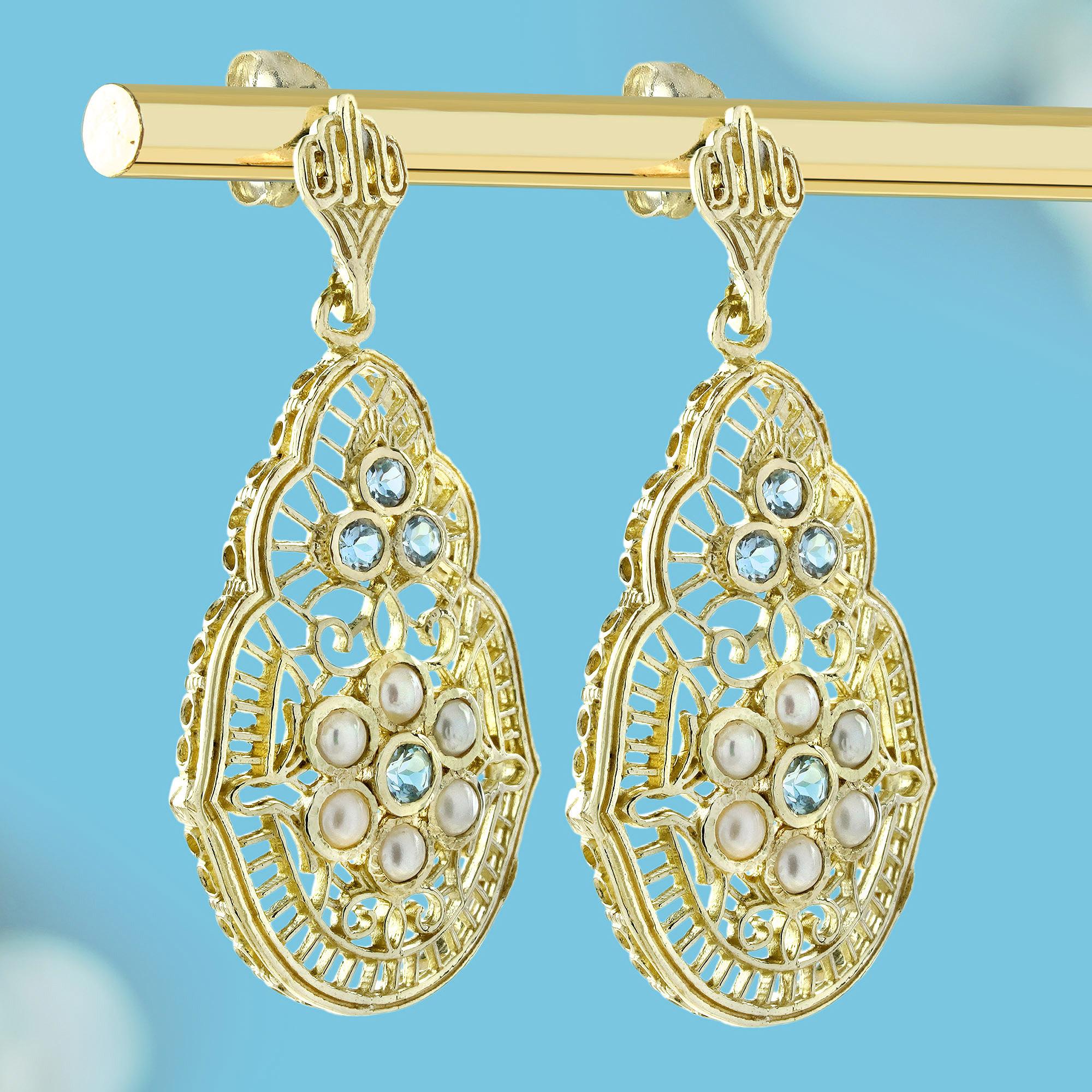 Pendiente colgante de filigrana estilo vintage de oro de 9 quilates con topacio azul natural y perla Eduardiano en venta