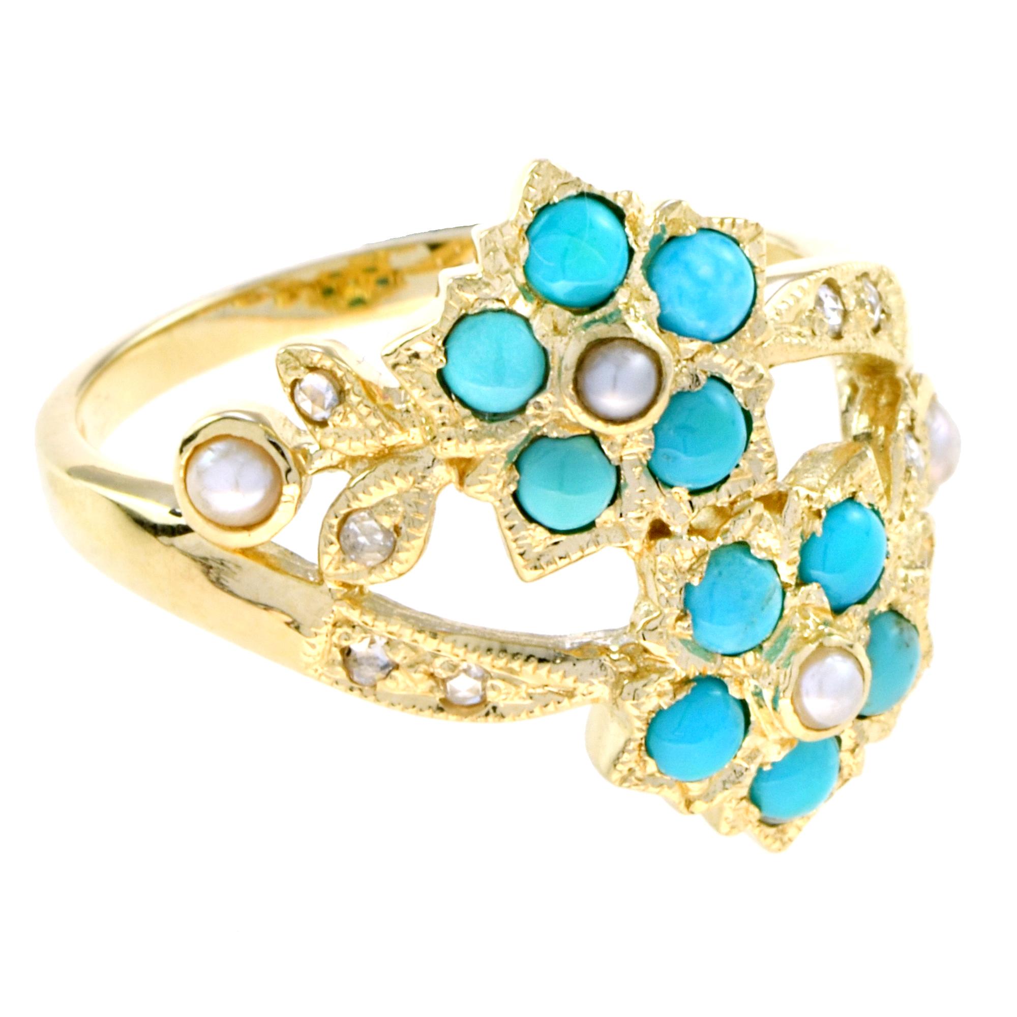 Cluster ring features a luminous natural pearl at the center, symbolizing elegance and purity. Surrounding it are vibrant turquoise stones arranged like delicate petals, with additional pearls representing tender buds. The shoulders are adorned with