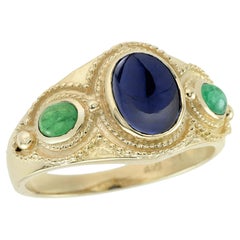 Anello in oro 9K con zaffiro naturale cabochon e smeraldo cabochon in stile vintage
