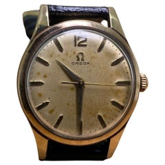 Omega Montre manuelle rare Calibre 420 vintage pour hommes des années 1950, en or 9 carats Tous originaux.