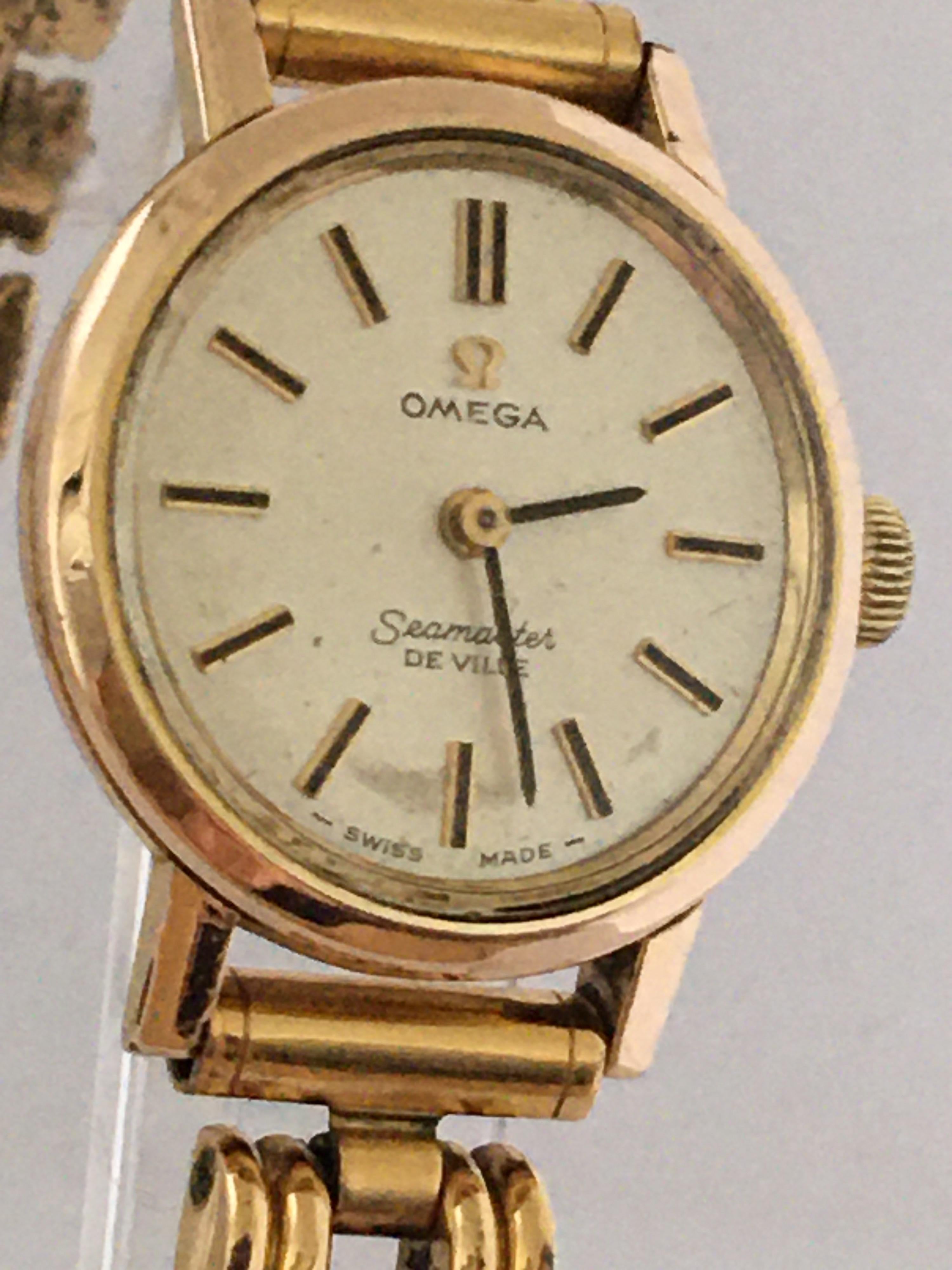 This beautiful 1970's gold little watch is working and it is ticking well. The gold plated winder & strap is a bit tarnished as shown. 

Please study the images carefully as form part of the description.