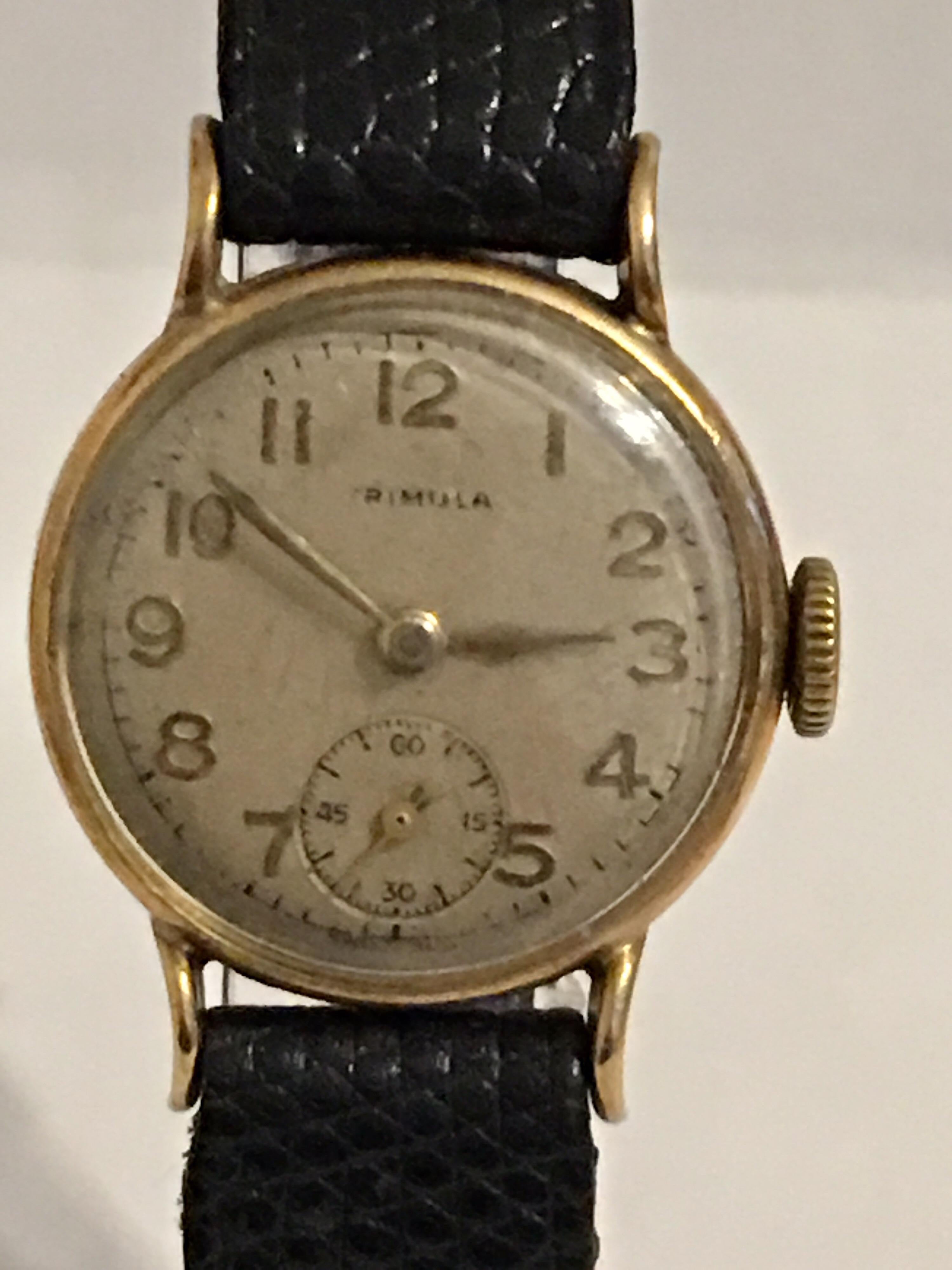 This Lovely mechanical ladies Gold watch is working and ticking well. The dial is tired as shown. Please study the images carefully as form part of the description.

