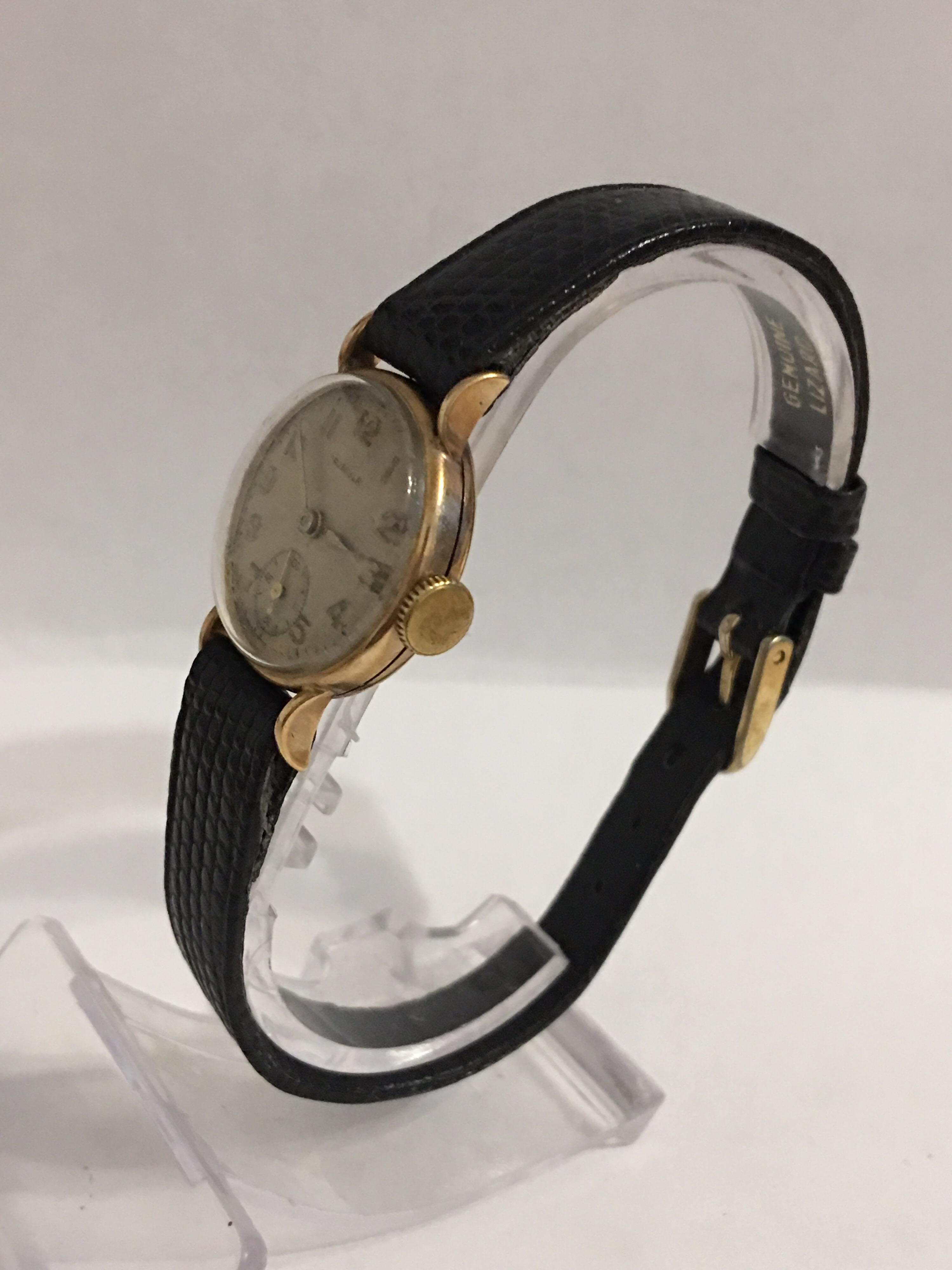 Women's or Men's 9 Karat Gold Vintage 1950s Ladies Swiss Wristwatch For Sale