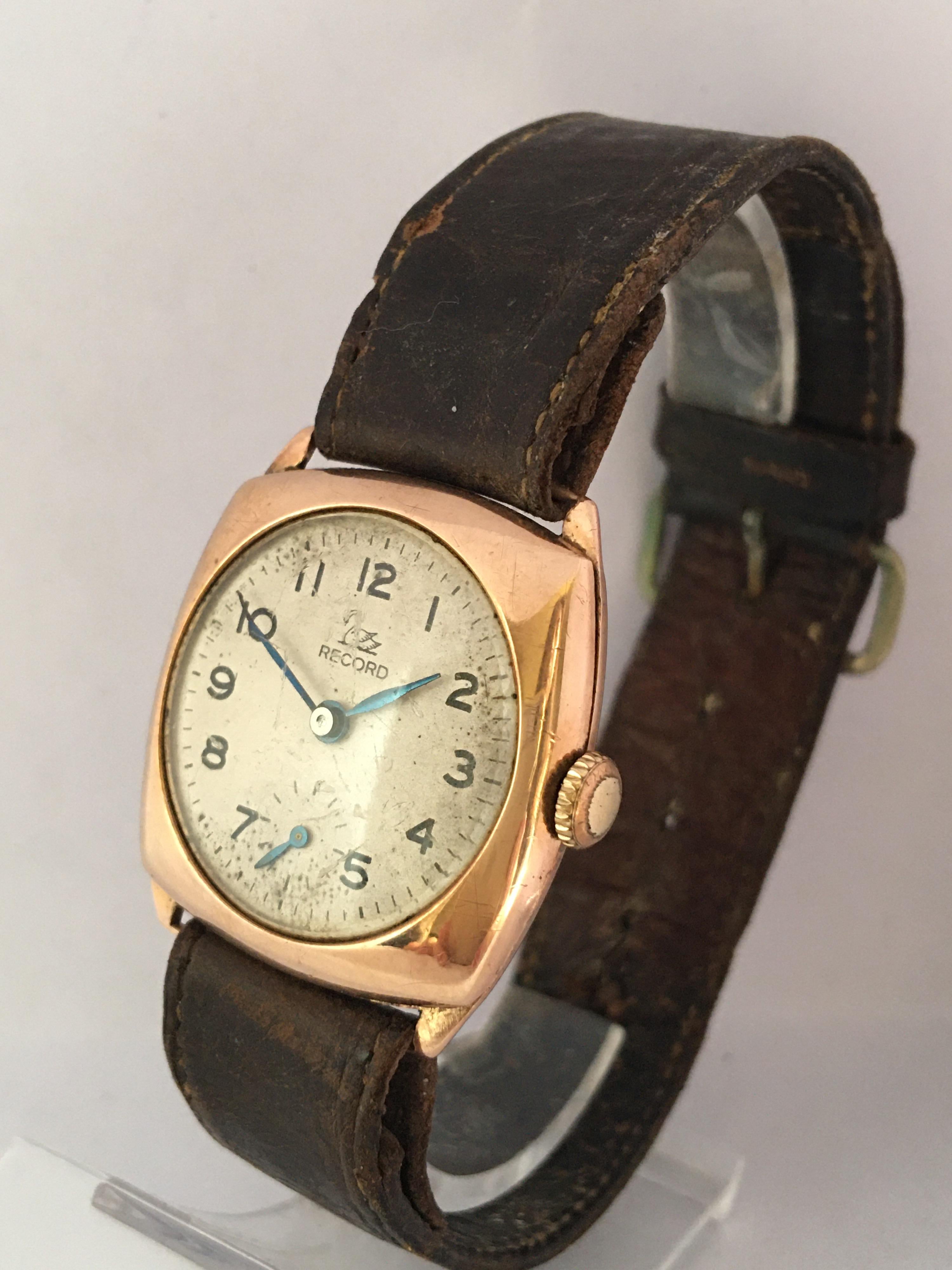 This beautiful pre-owned vintage hand winding gold wristwatch is in good working condition and it is running well. Visible signs of ageing and wear with light marks on the glass surface and on the watch case as shown. The silvered dial has aged. The