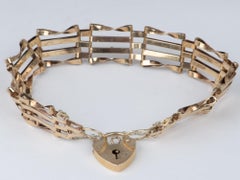 Pulsera vintage de oro de 9 quilates con eslabones tipo reja y cierre de corazón con candado, 7,25", con cierre de seguridad