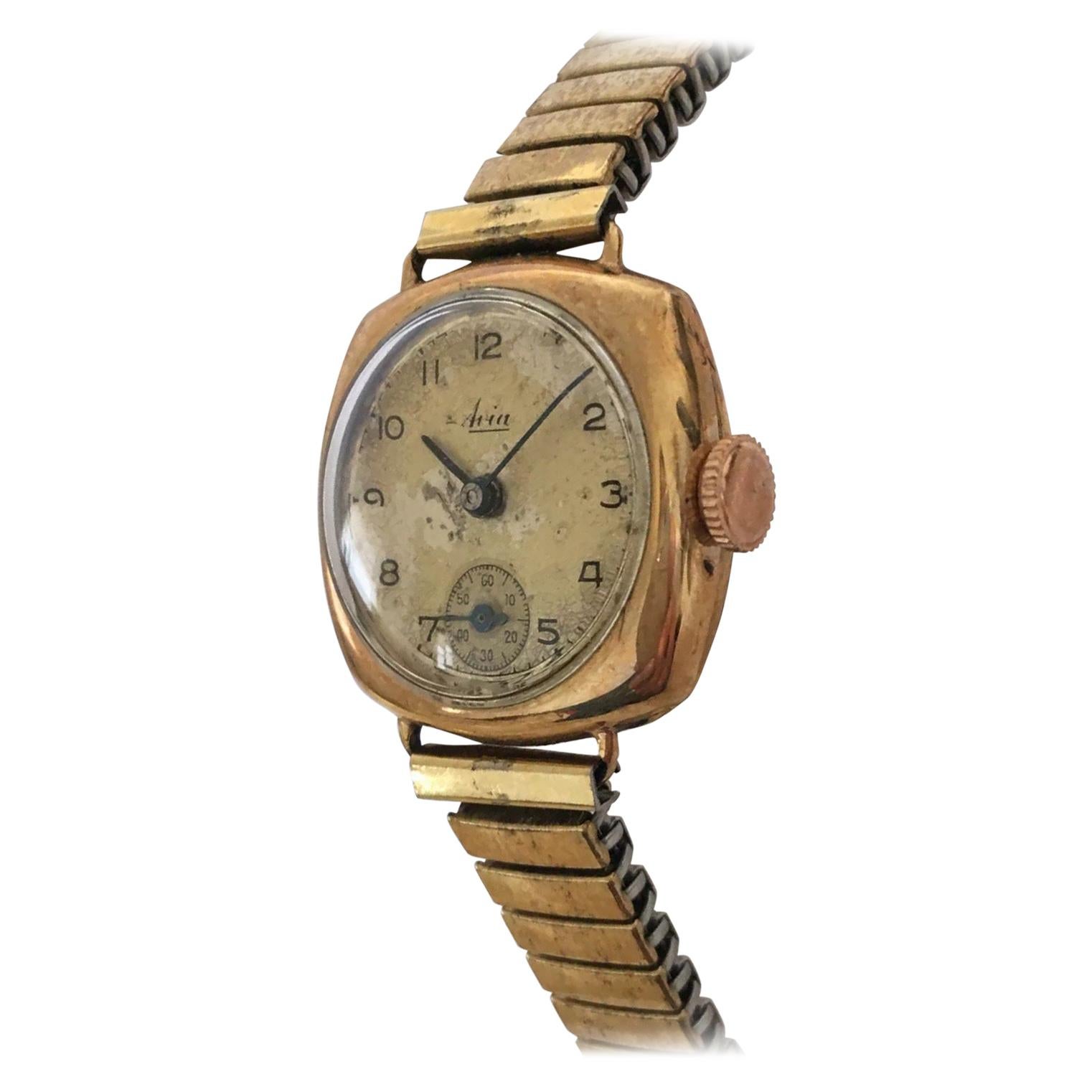 9 Karat Gold Vintage Ladies Avia Wristwatch with Flexible Strap For Sale