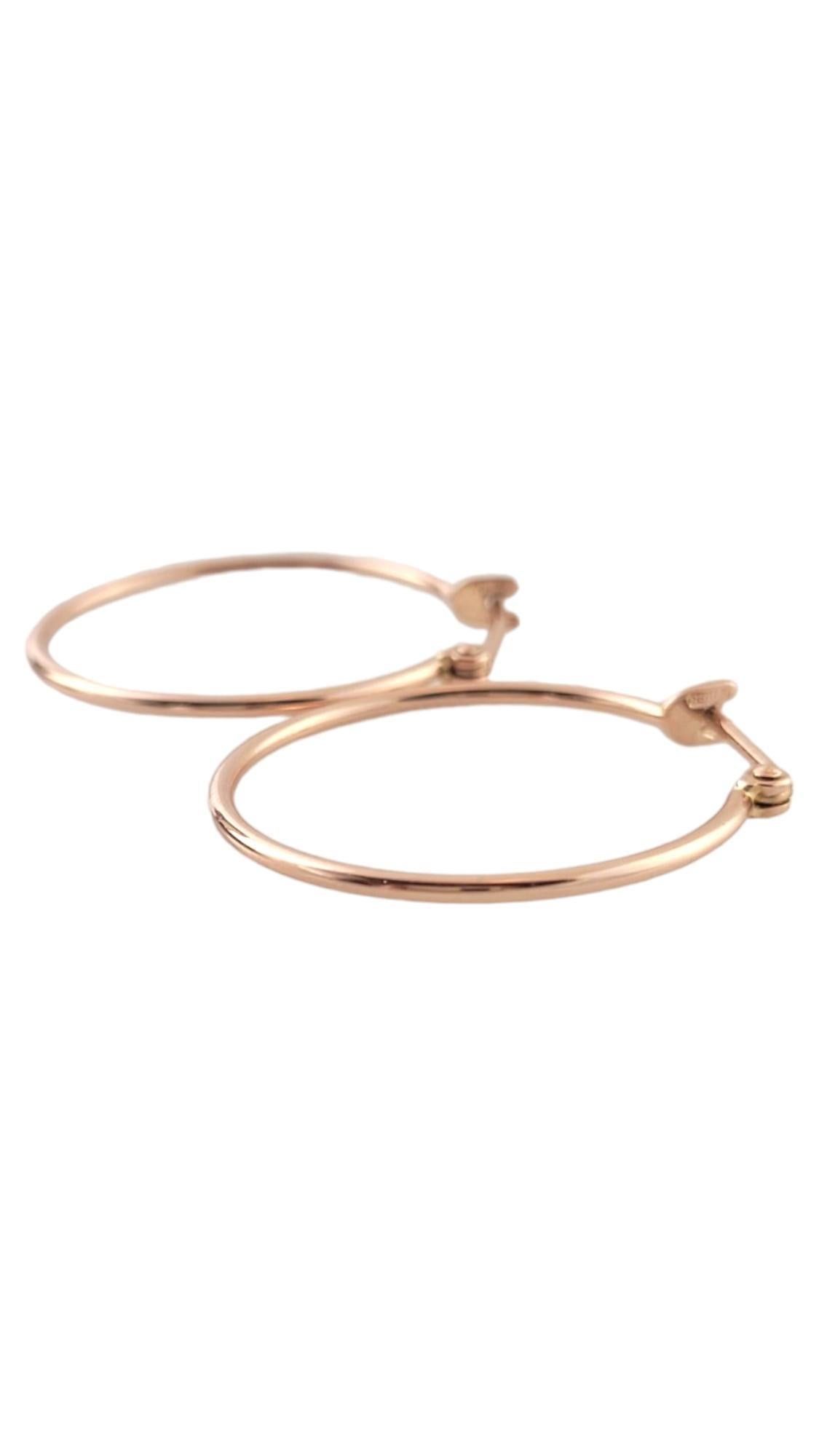 9K Rose Gold Hoop Earrings

This classic set of beautiful hoops were crafted from 9K rose gold!

Diameter: 26.2mm
Width: 1.4mm

Weight: 1.5 dwt/ 2.3 g

Hallmark: 375 star 2053 mi

Very good condition, professionally polished.

Will come packaged in