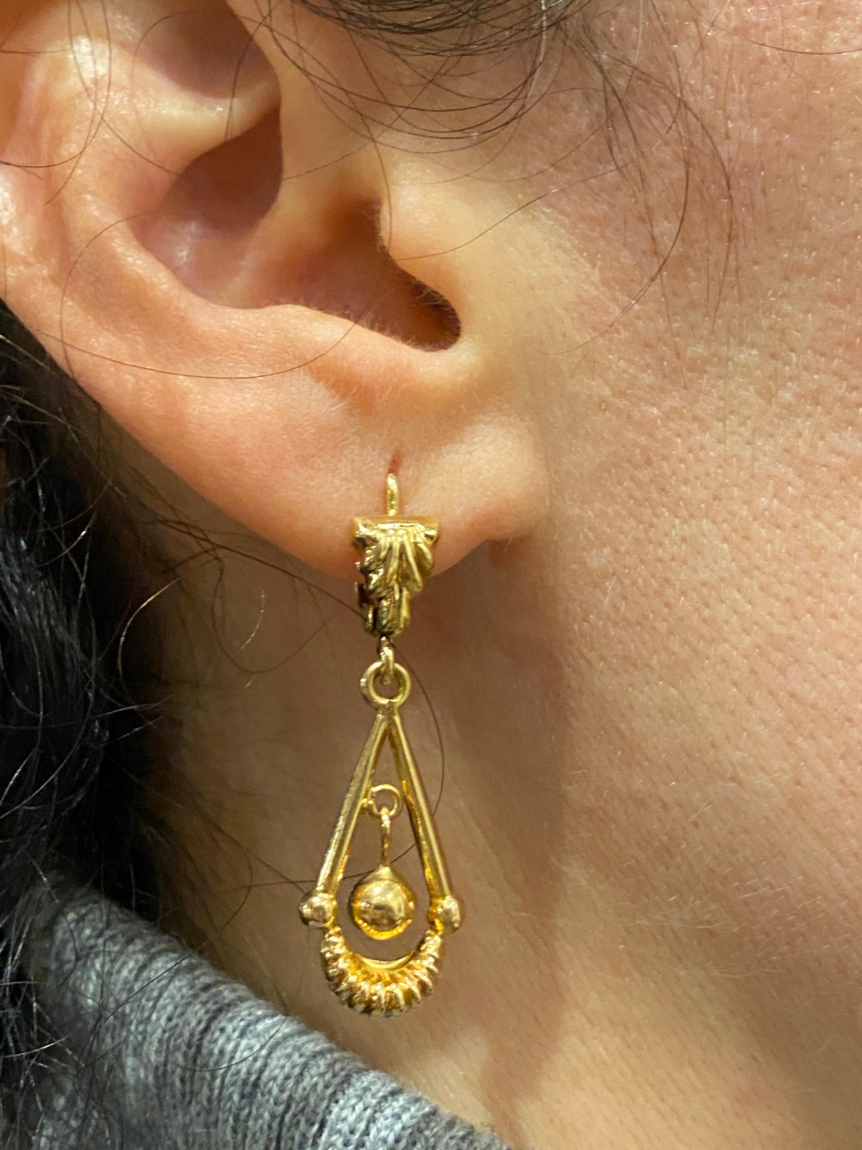 Meticulously crafted in 9K Rose Gold 

this exquisite Pair of Drop / Pendant Earrings

is retro, yet a fine example of Etruscan Revival style.

 

Etruscan Revival “Archaeological” style pieces 

reflect the fascination of Victorian era women with