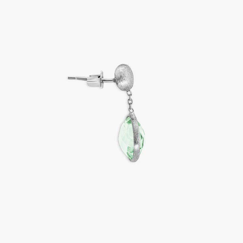 9K satin white gold Kensington drop earrings with green amethyst

Our short drop earrings feature small green amethyst stones set in 9K white gold. As the latest addition to our Kensington Collection, each piece combines single or double stones in